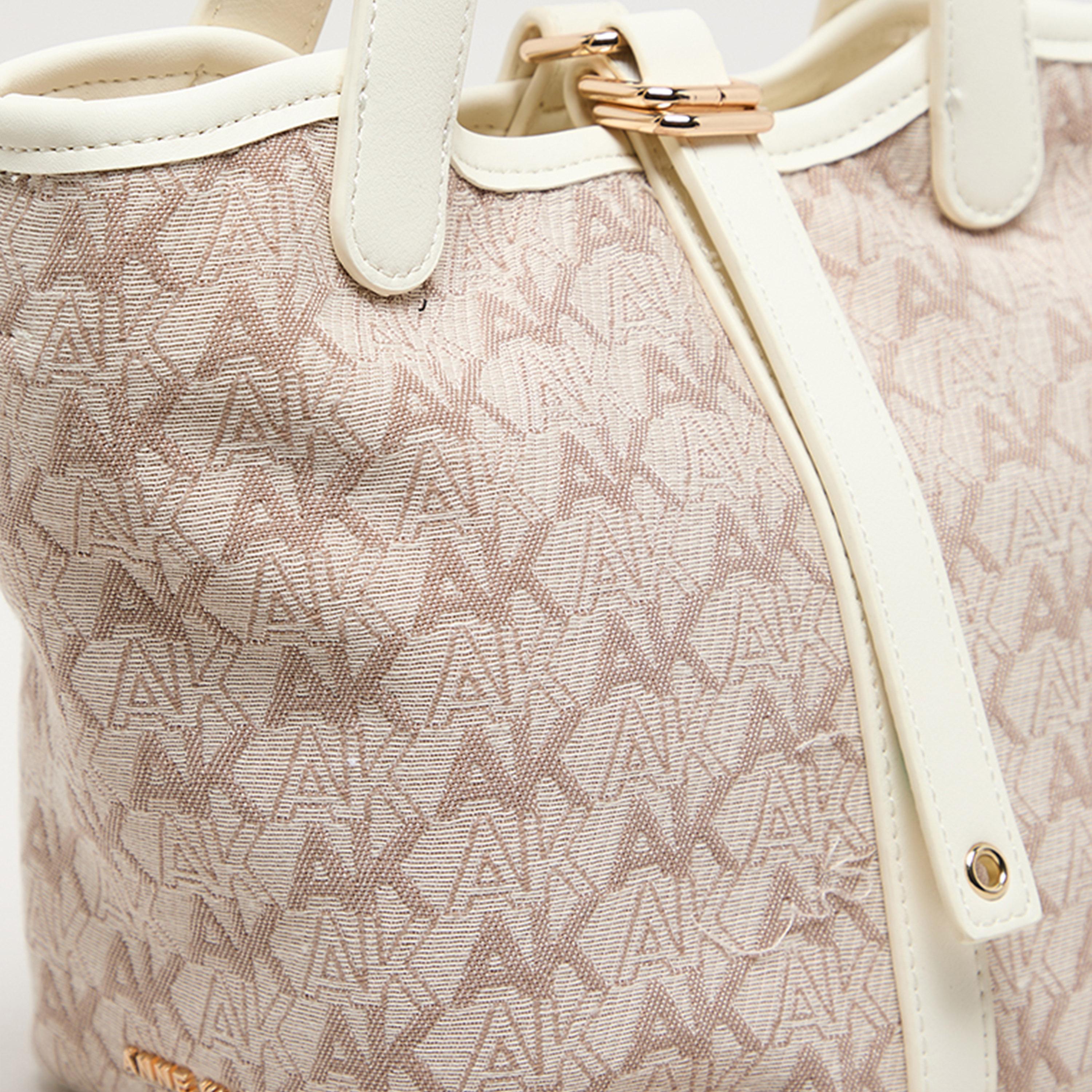 آن كلين - شنطة يد بمقبض علوي مزينة بشعار مونوجرام وفتحة علوية-women-bagsandwallets-handbags-image-4