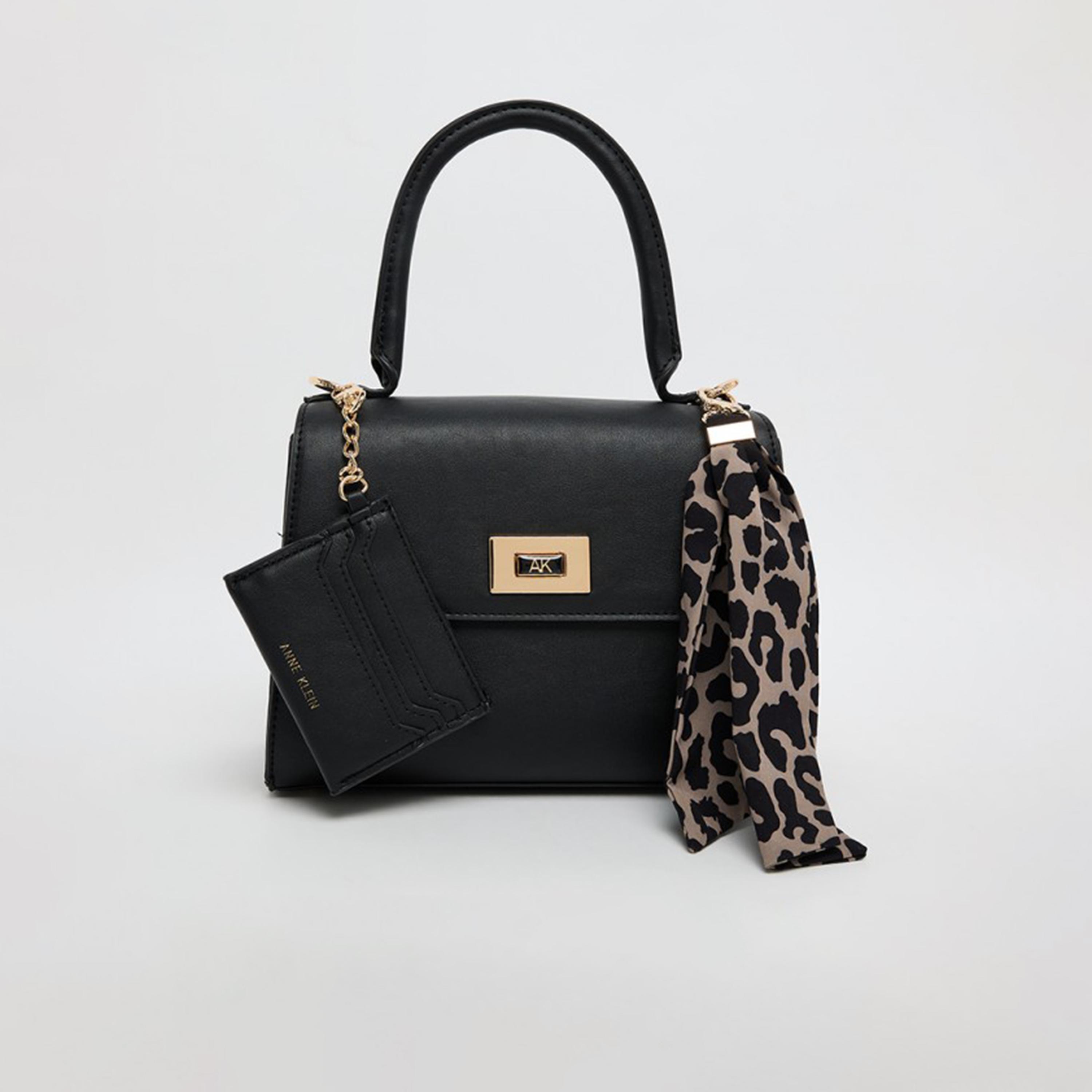 آن كلين - تفاصيل التصميم: شنطة يد بمقبض علوي وقفل دوار-women-bagsandwallets-handbags-image-1