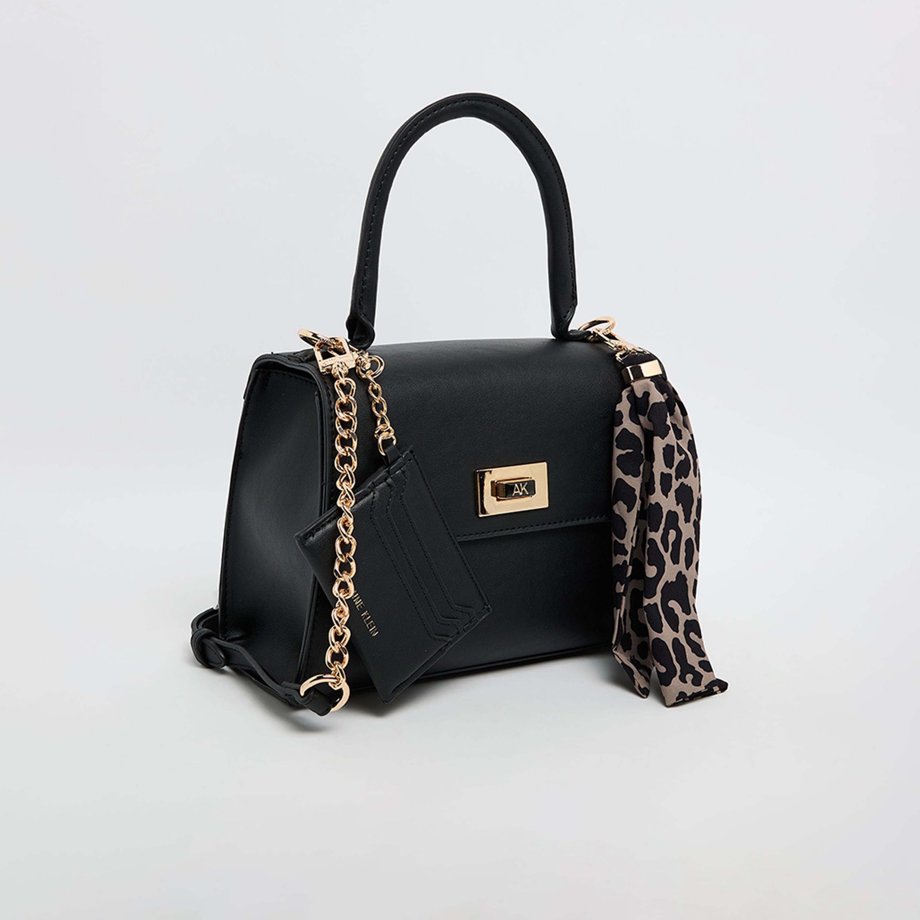 آن كلين - تفاصيل التصميم: شنطة يد بمقبض علوي وقفل دوار-women-bagsandwallets-handbags-image-3