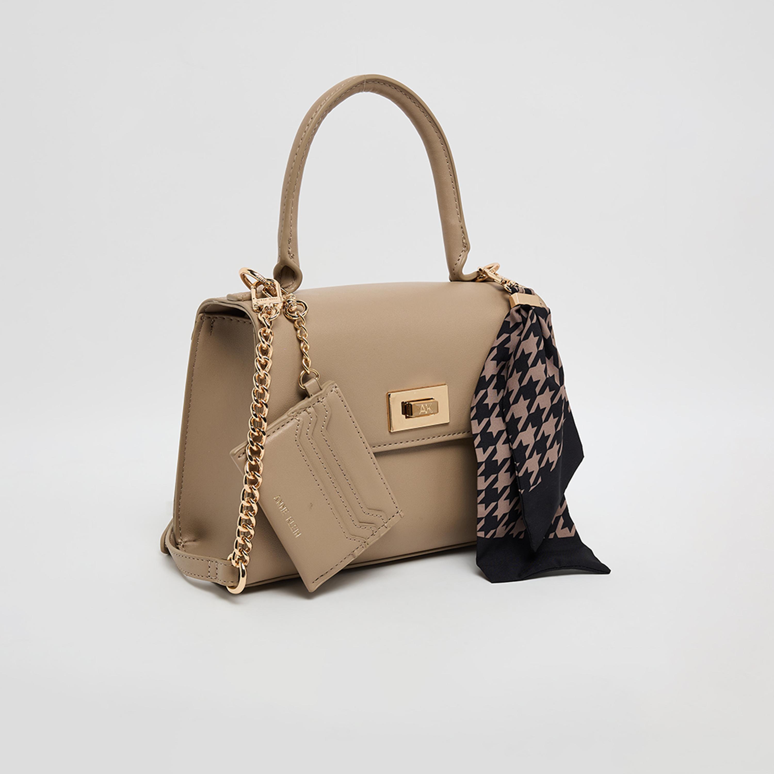 آن كلين - تفاصيل التصميم: شنطة يد بمقبض علوي وقفل دوار-women-bagsandwallets-handbags-image-3