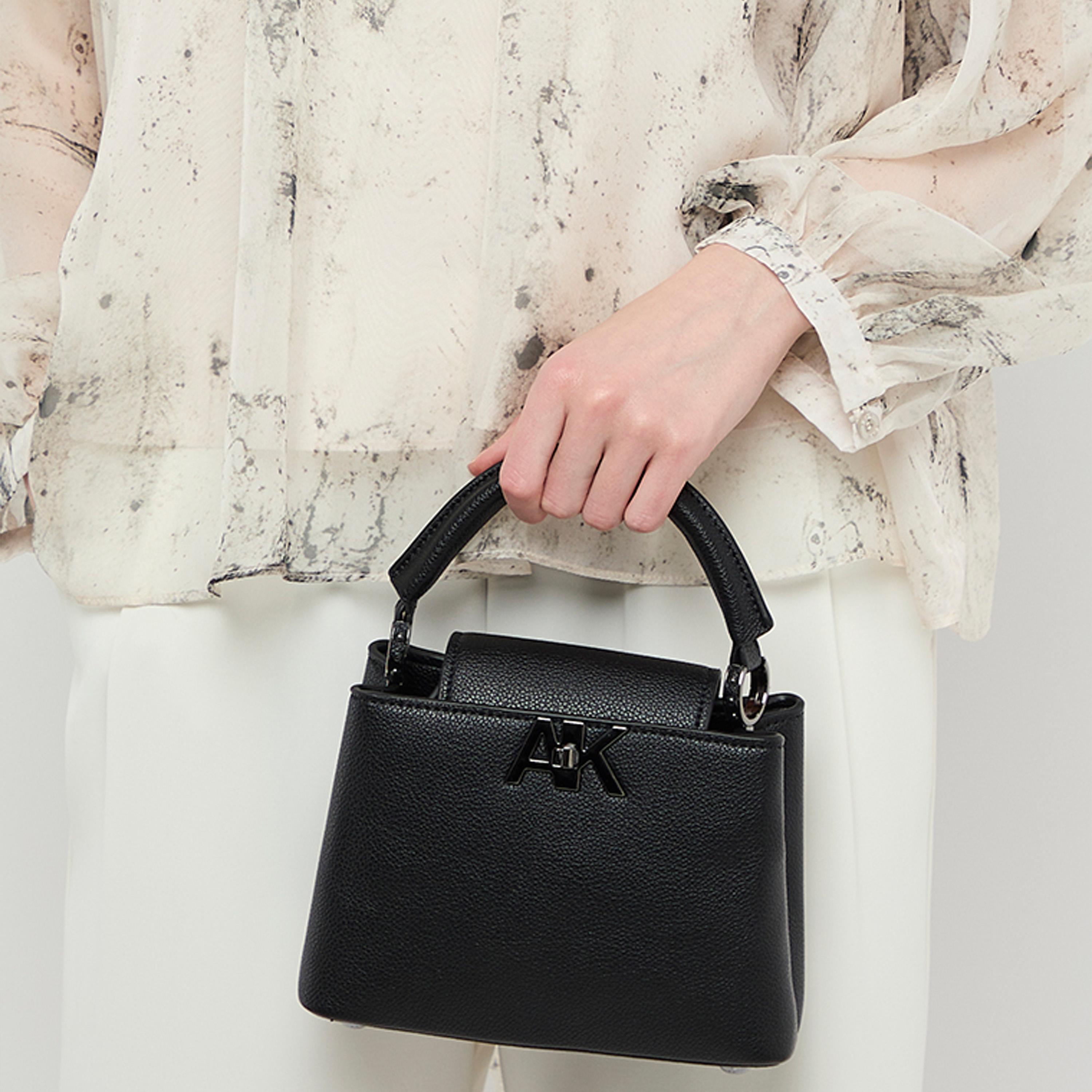 آن كلين - شنطة يد بمقبض علوي مزخرف وقفل دوار وحزام قابل للتعديل | 19.5 × 14 × 7.5 سم-women-bagsandwallets-handbags-image-2