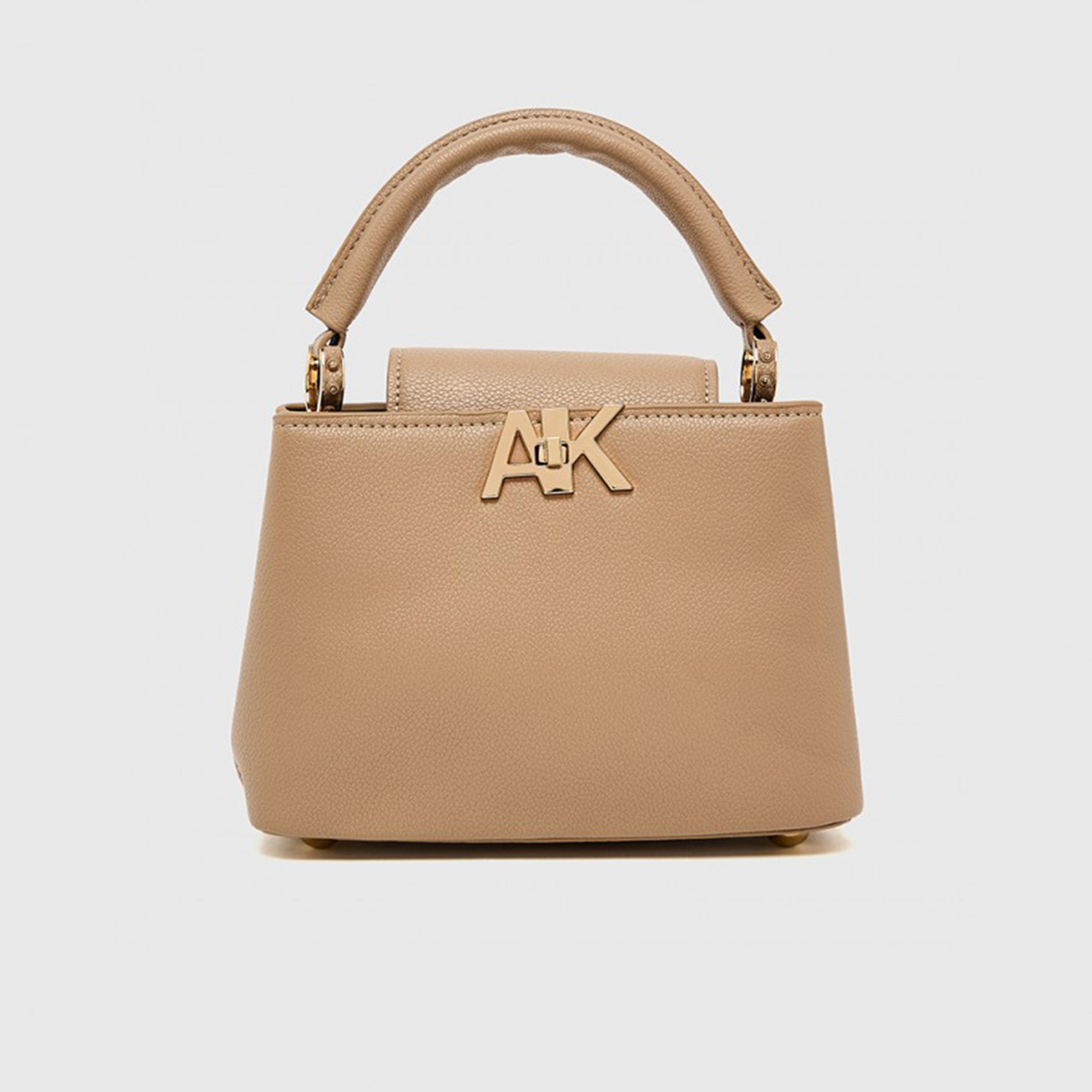 آن كلين - شنطة يد بمقبض علوي مزخرف وقفل دوار وحزام قابل للتعديل | 19.5 × 14 × 7.5 سم-women-bagsandwallets-handbags-image-1
