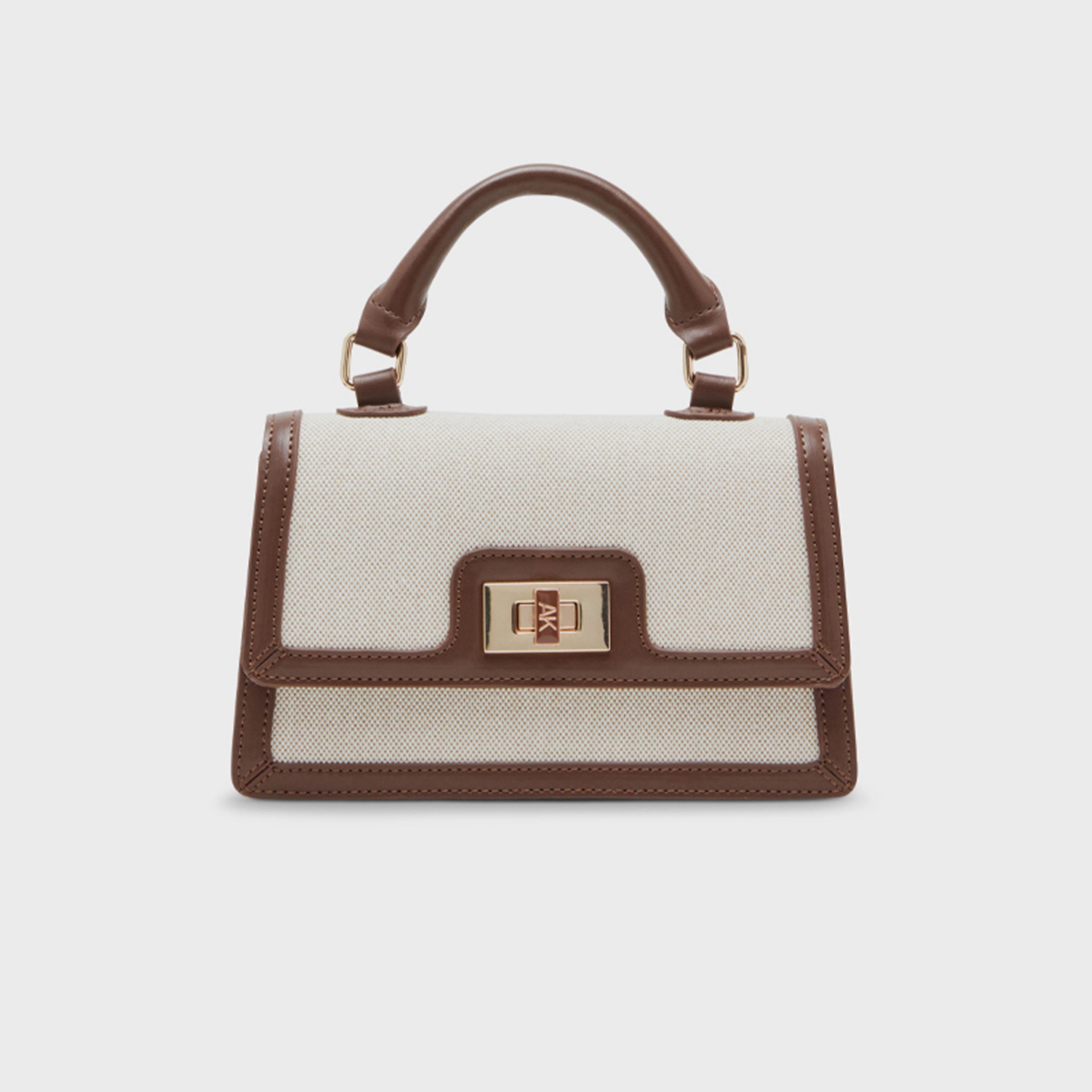 آن كلين - شنطة يد سادة بمقبض علوي وقفل دوار حزام قابل للفصل | 49.53 × 10.16 × 26.67 سم-women-bagsandwallets-handbags-image-1