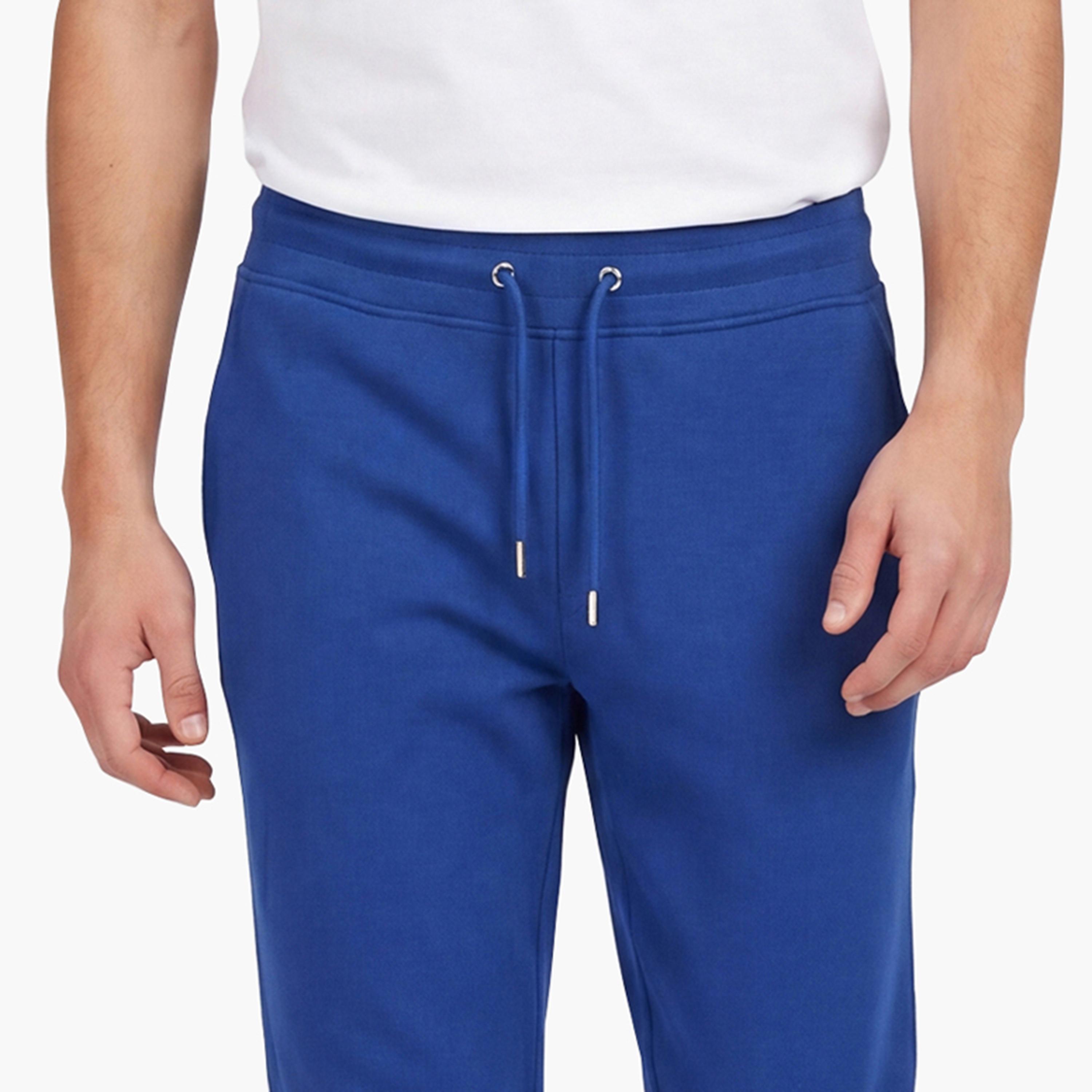 بنطال رياضي (جوغر) رجالي سادة بخصر متوسط الارتفاع ورباط قابل للتعديل من غانت-men-clothing-bottoms-joggers-image-3