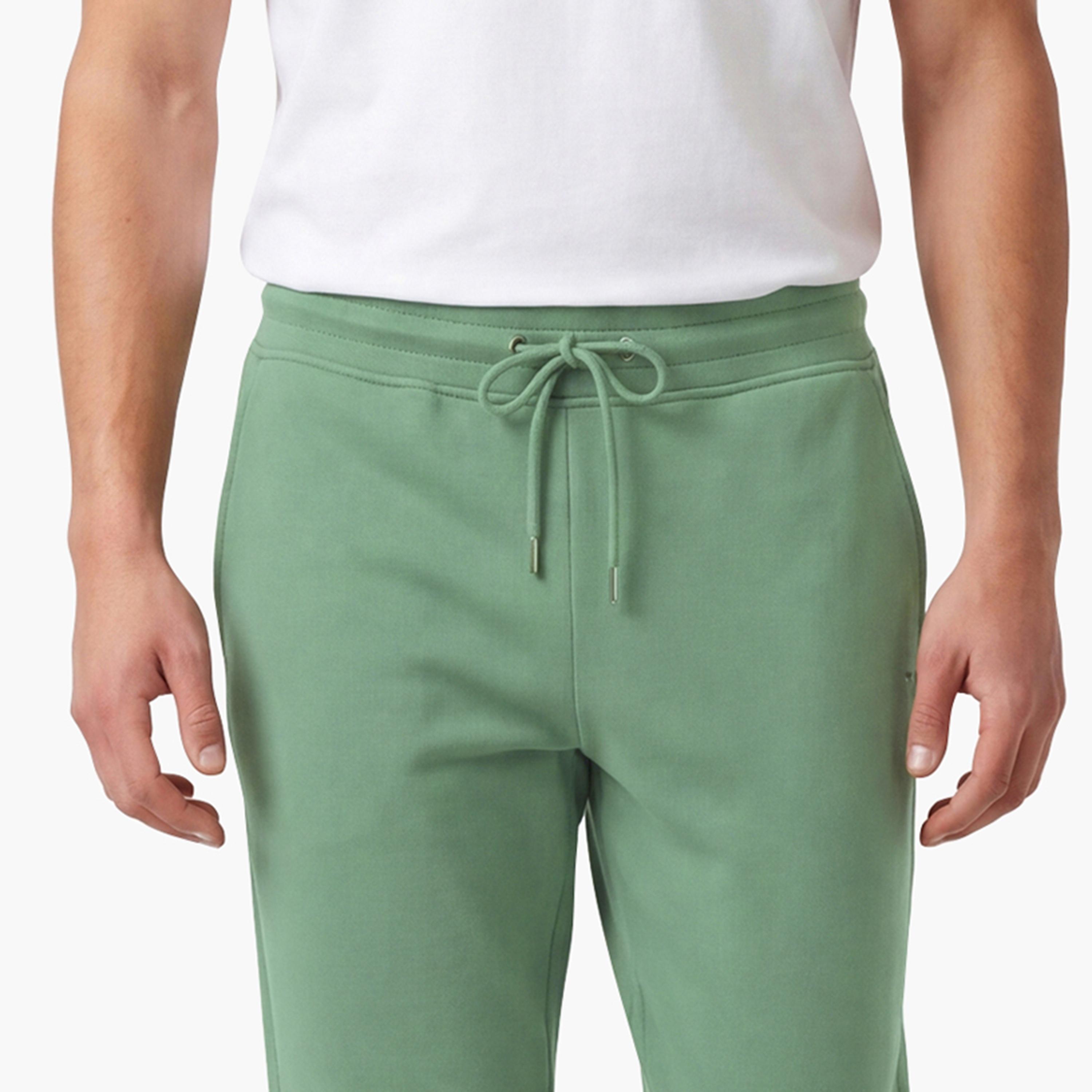 بنطال رياضي (جوغر) رجالي سادة بخصر متوسط الارتفاع ورباط قابل للتعديل من غانت-men-clothing-bottoms-joggers-image-3