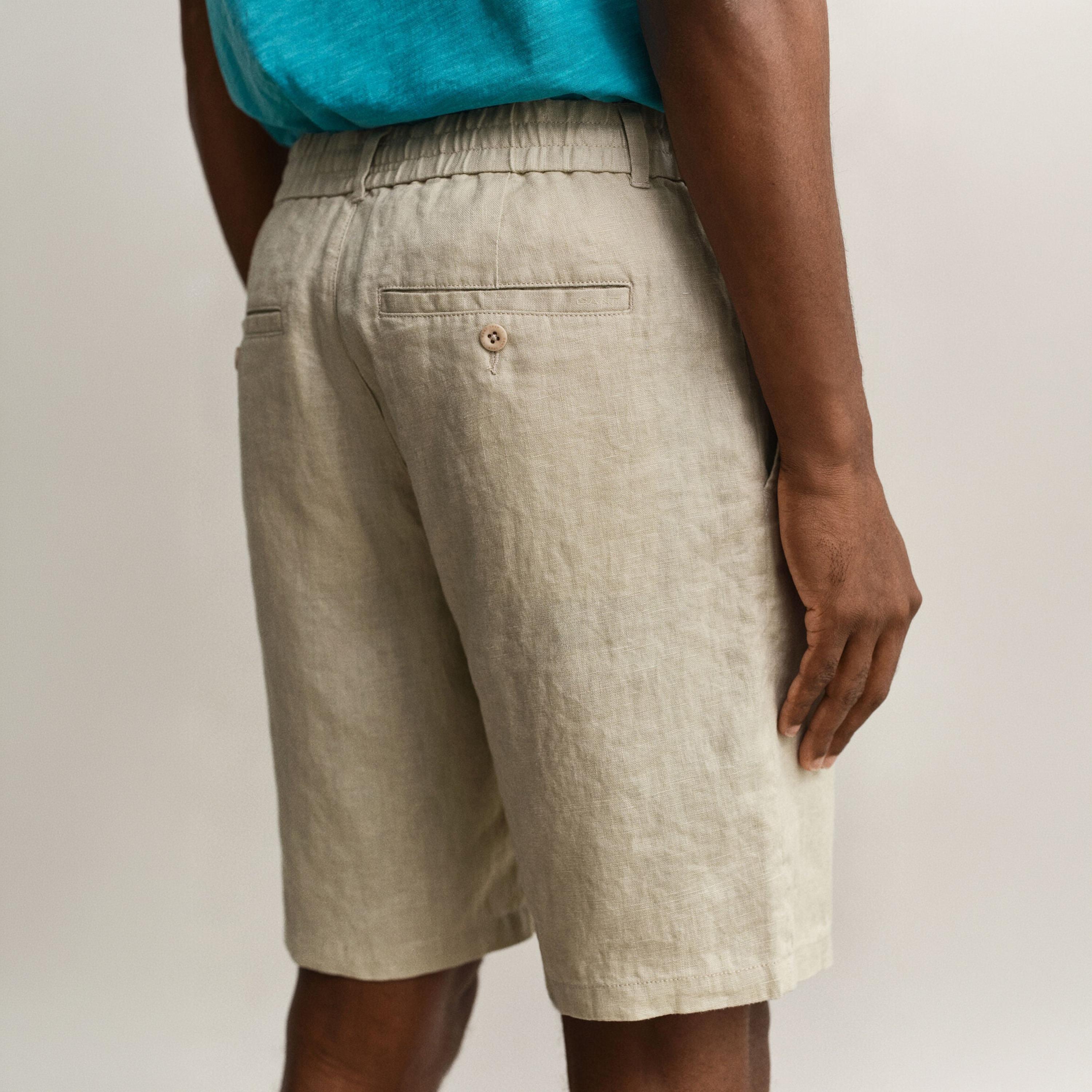 شورت كتان رجالي سادة بخصر متوسط الارتفاع وإغلاق بزر ورباط من غانت-men-clothing-bottoms-shorts-image-3