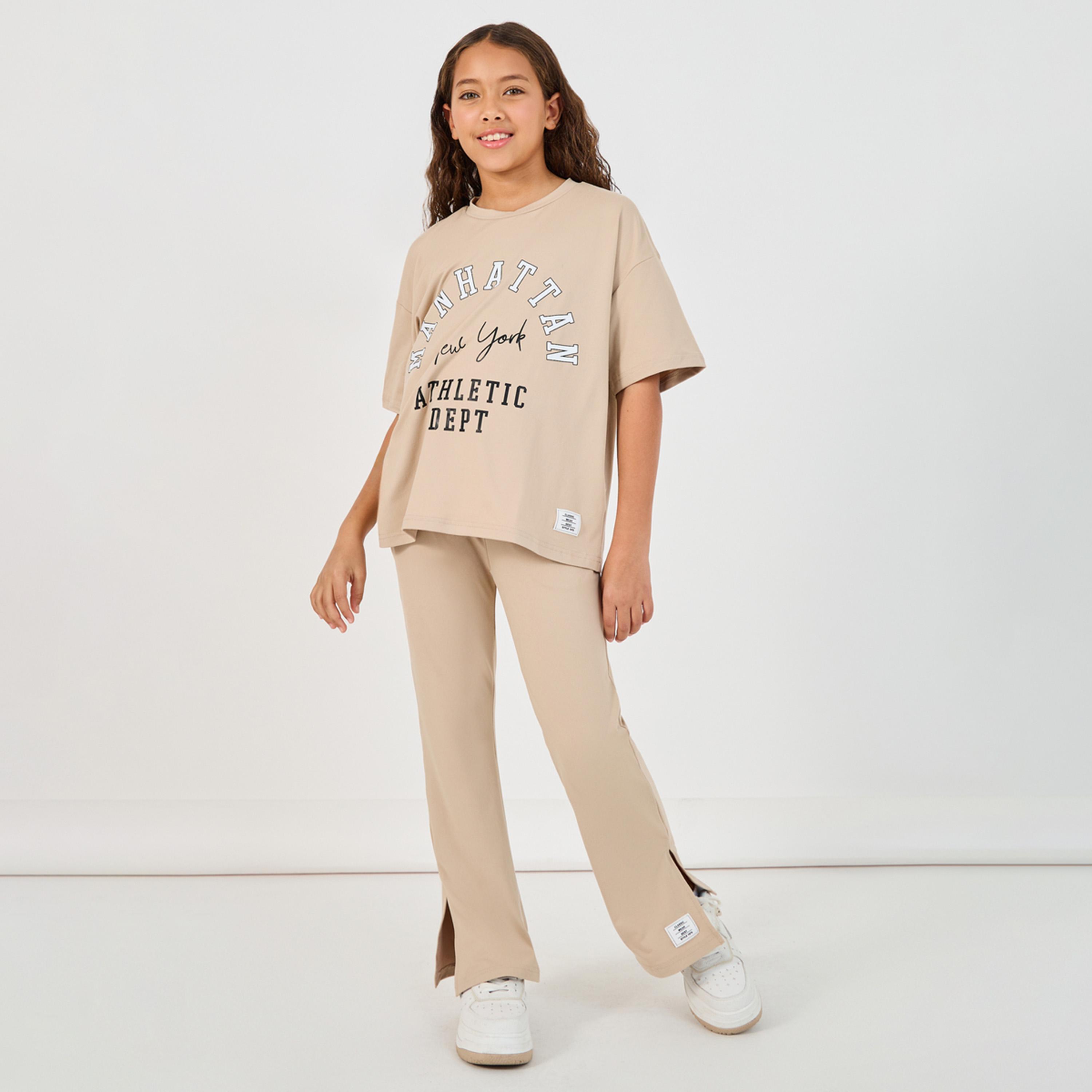 Styli Graphic Print Round Neck T-Shirt & High Rise Pants Co-Ords-girls-clothing-setsandcoords-image-1
