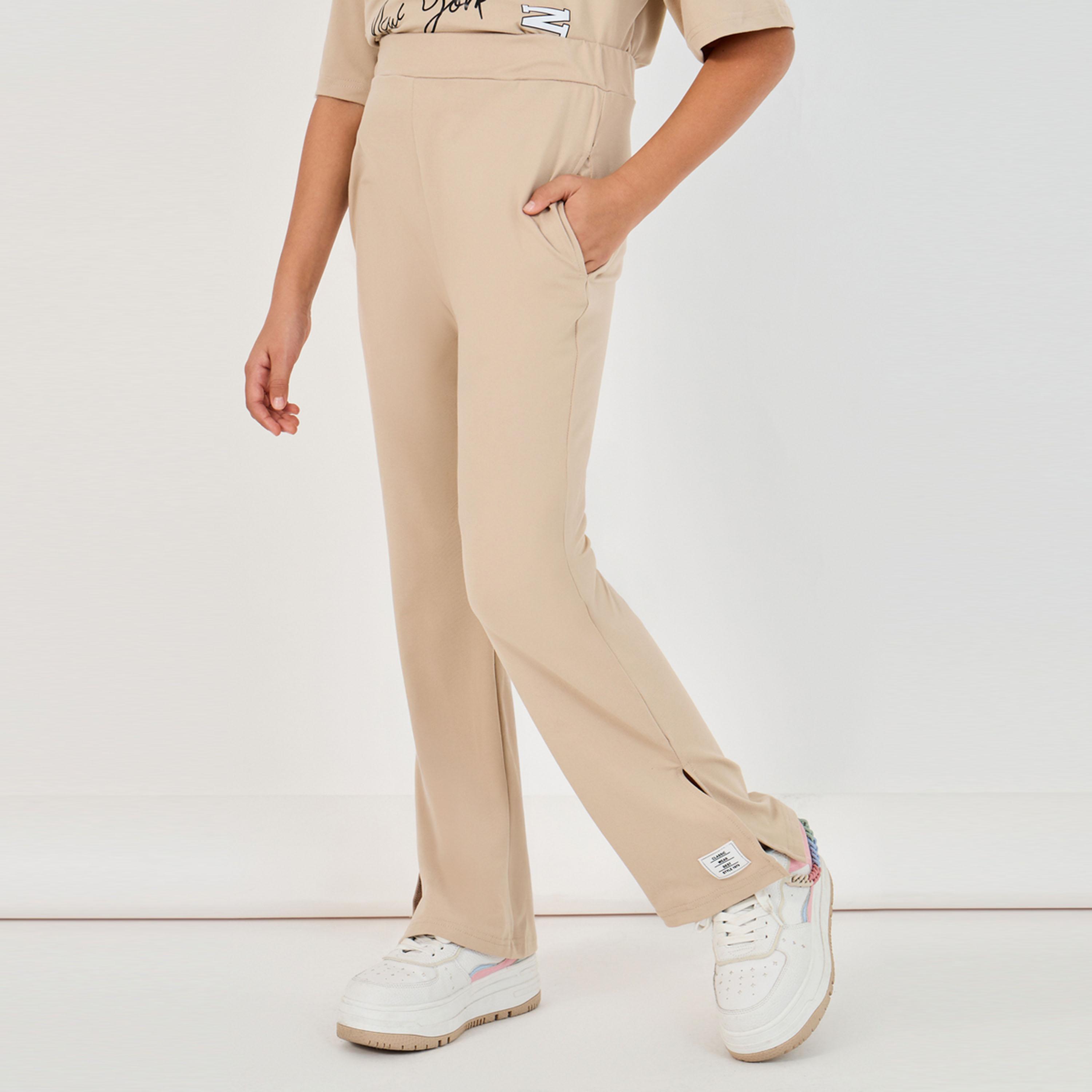 ستايلي - طقم تي شيرت بطبعة جرافيكية ورقبة دائرية مع بنطال بخصر مرتفع-girls-clothing-setsandcoords-image-4