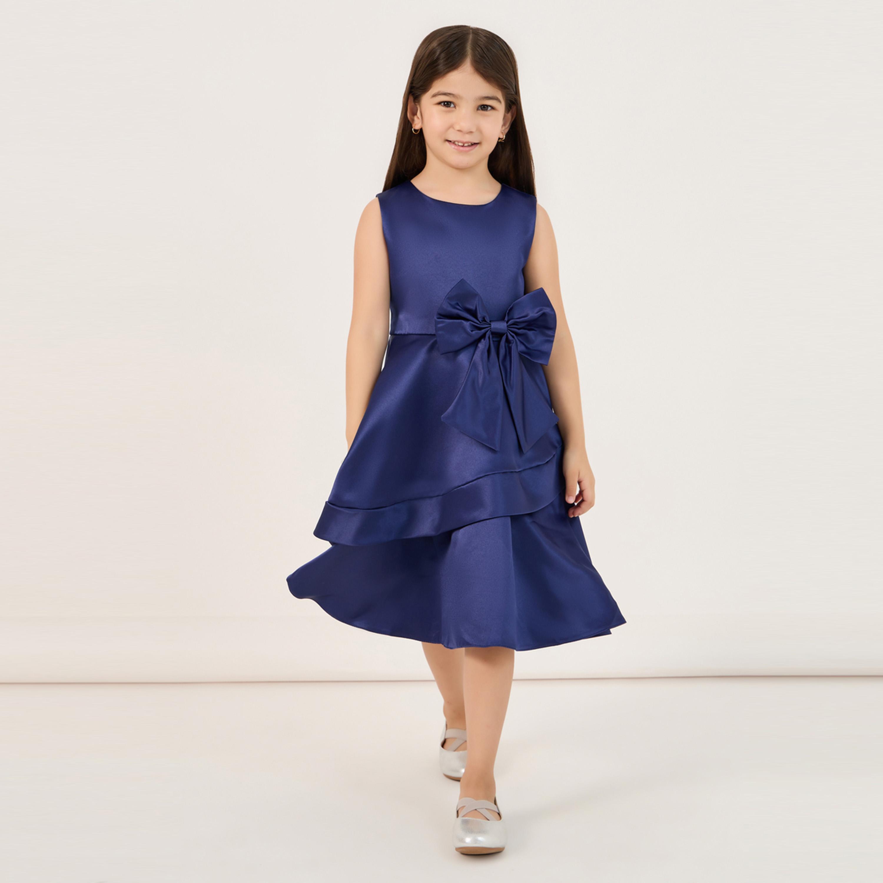 ستايلي - فستان سادة بدون أكمام بطول الركبة مع فيونكة-girls-clothing-dressesandjumpsuits-image-1