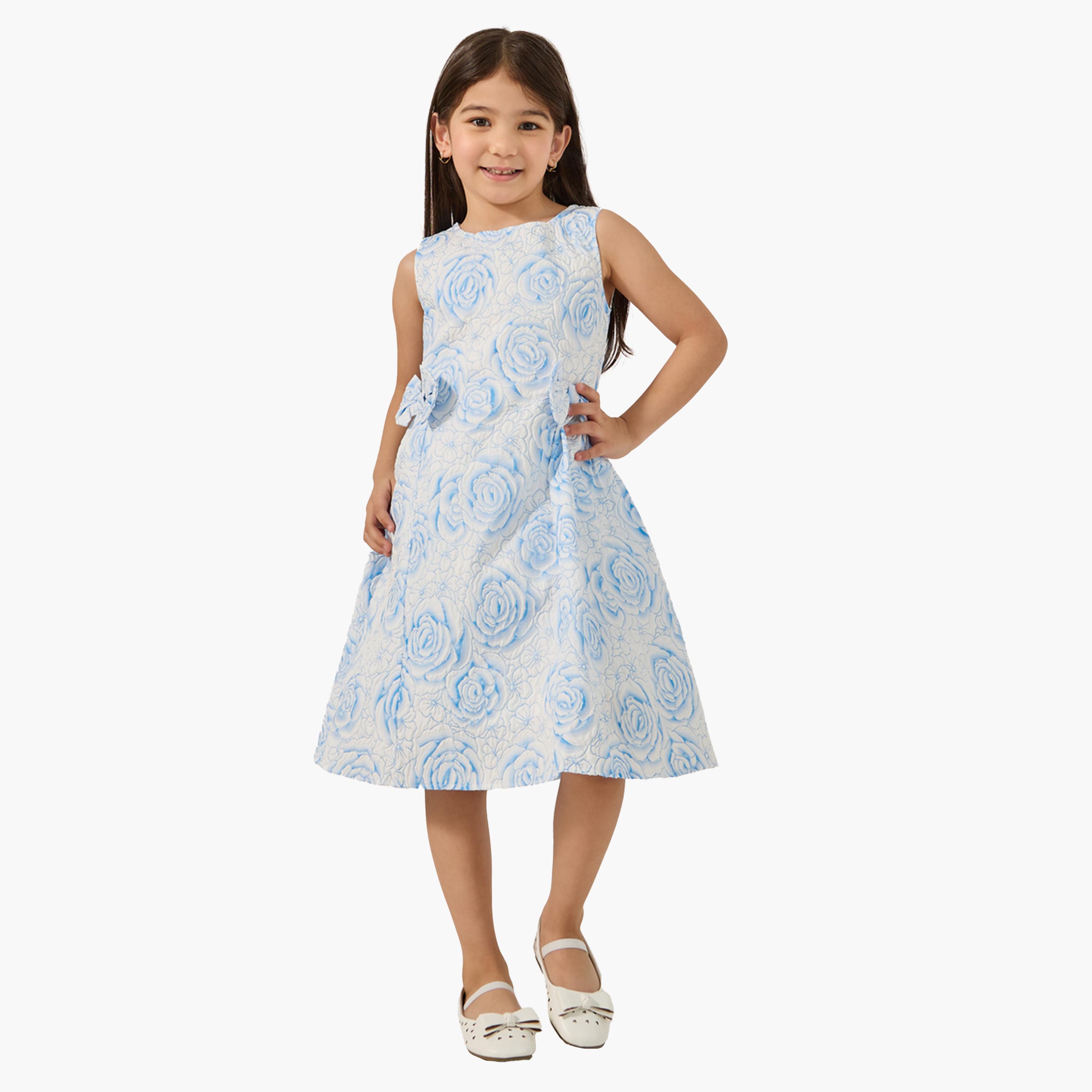 ستايلي- فستان بدون أكمام بطباعة كاملة مع تفاصيل فيونكة جانبية-girls-clothing-dressesandjumpsuits-image-1