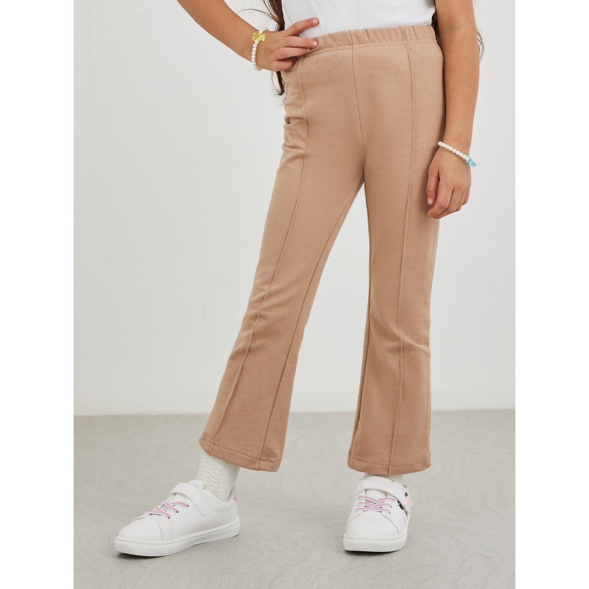 Styli Girls Beige Solid Pin Tuck Flared Leggings-girls-clothing-bottoms-leggings-image-1