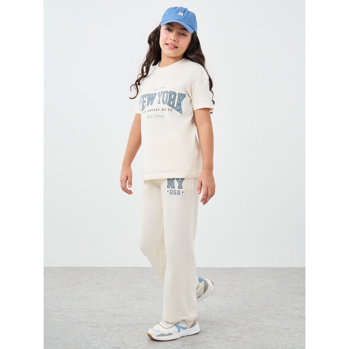 Styli Girls Off White Slogan Print Oversized T-Shirt and Wide Leg Joggers Set-girls-clothing-setsandcoords-image-2