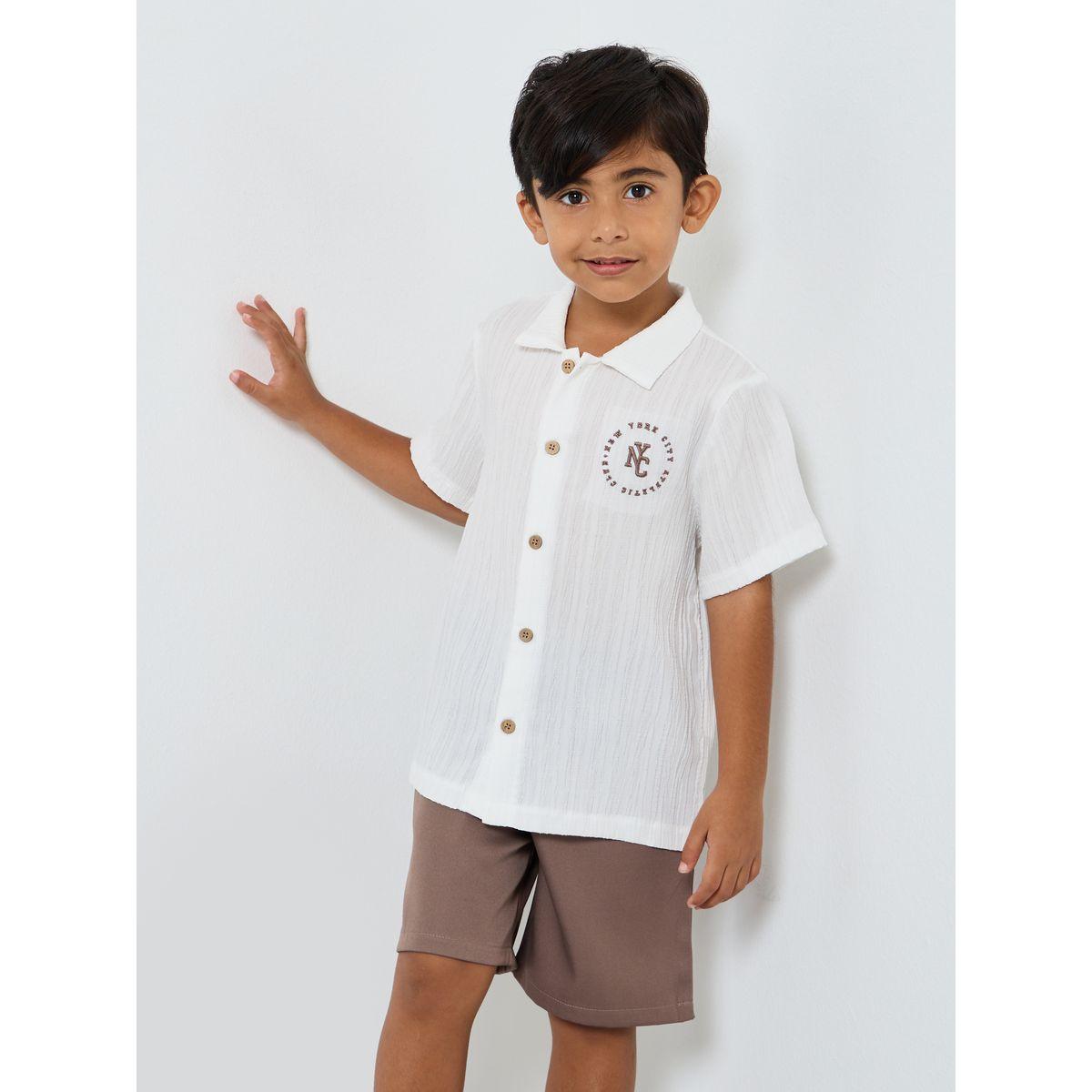 مجموعة من شورت وقميص بتفاصيل مُطرّزة-boys-clothing-setsandcoords-image-2