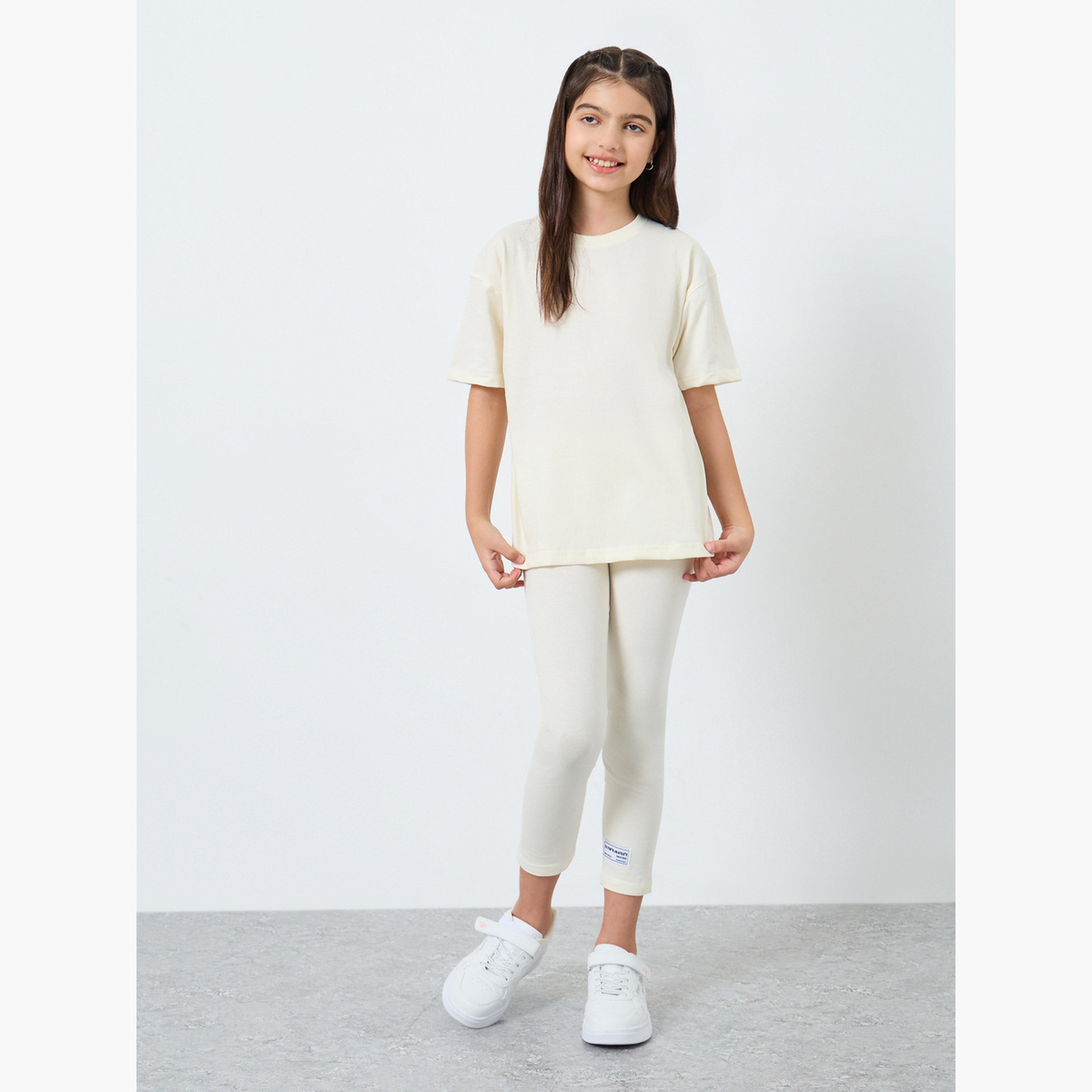 ستايلي - طقم تي شيرت وبنطال ضيق نقشة شعار تصميم واسع-girls-clothing-setsandcoords-image-1