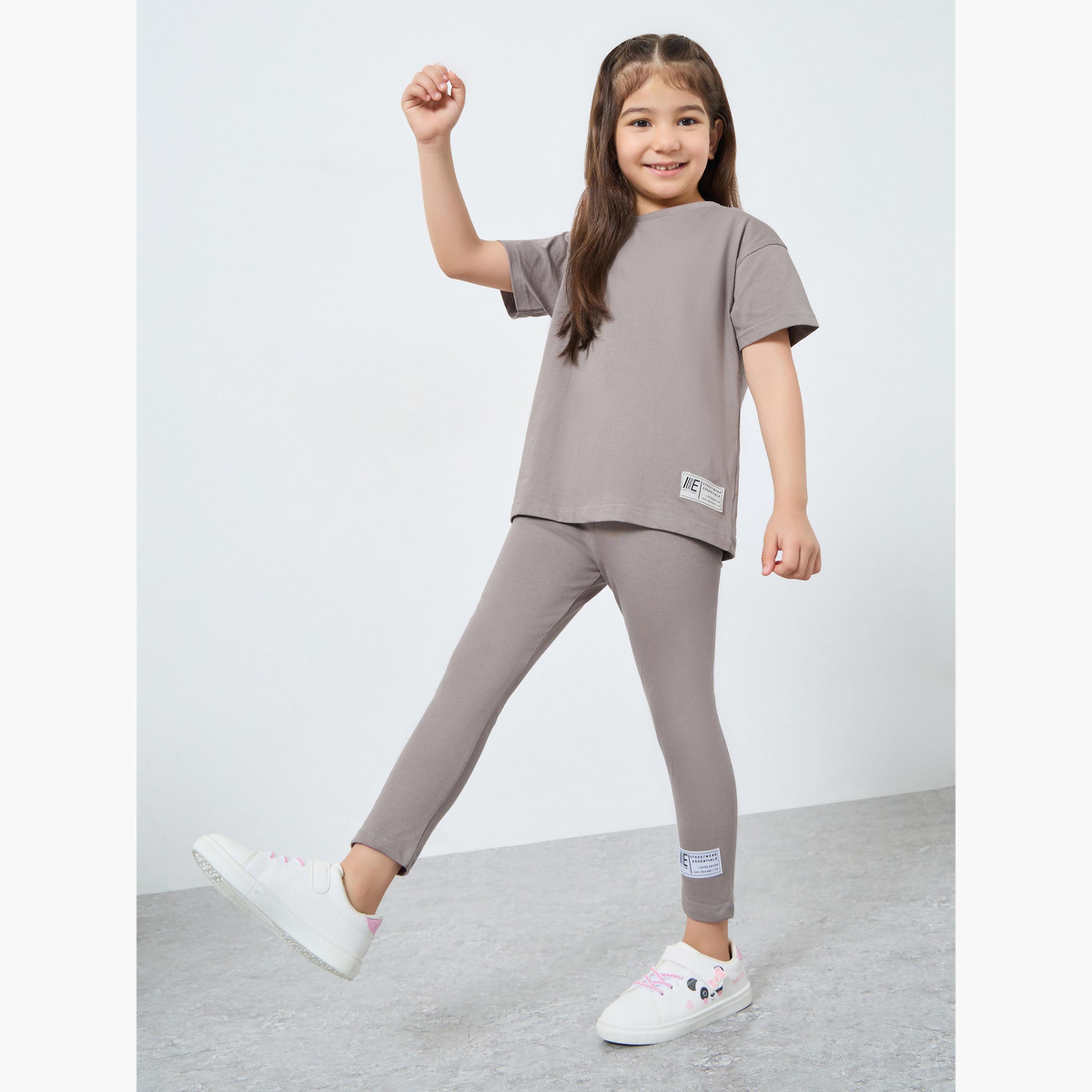 ستايلي - طقم تي شيرت وبنطال ضيق سادة تصميم واسع-girls-clothing-setsandcoords-image-1
