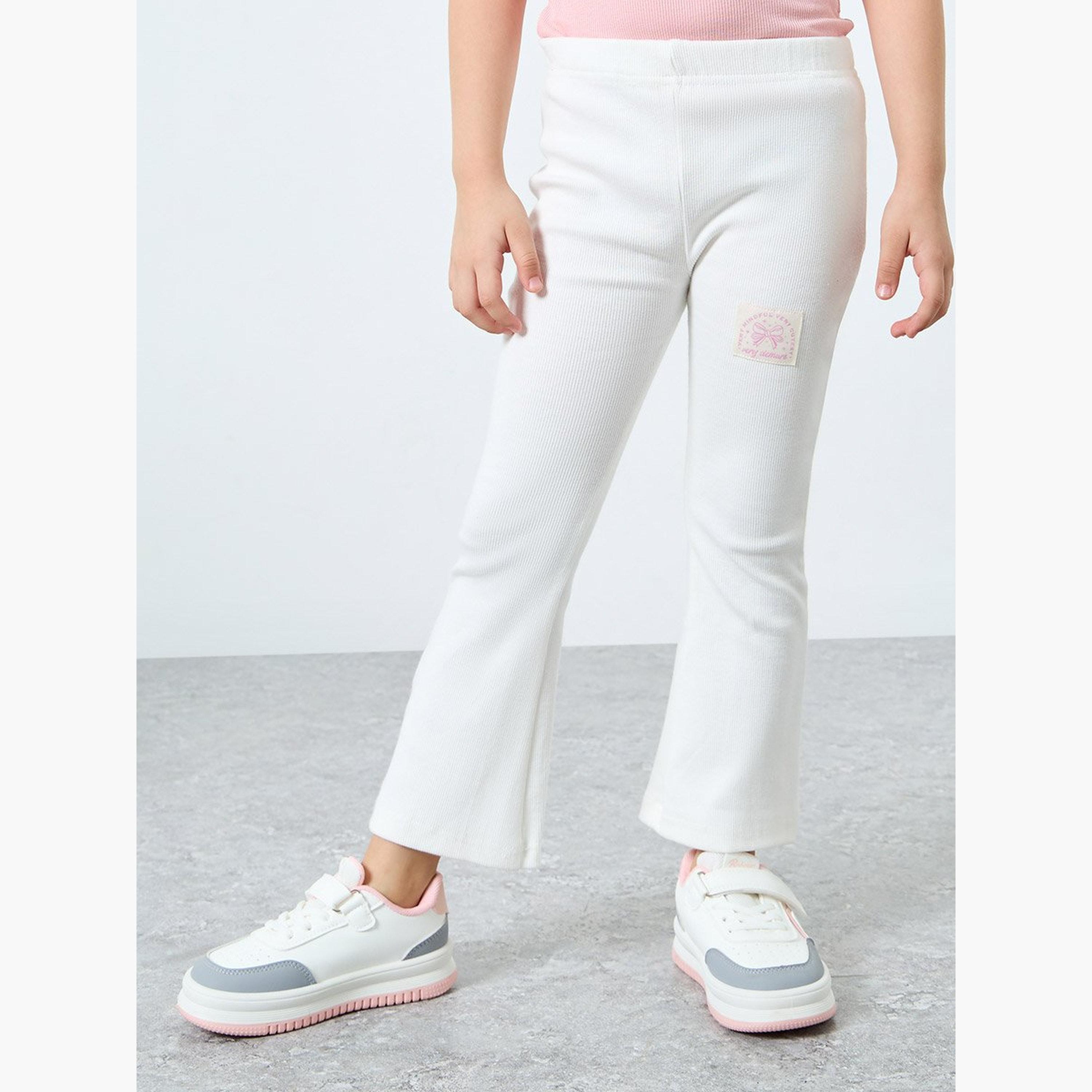 Styli Girls White Ribbed Flared Leggings with Badge-girls-clothing-bottoms-leggings-image-1