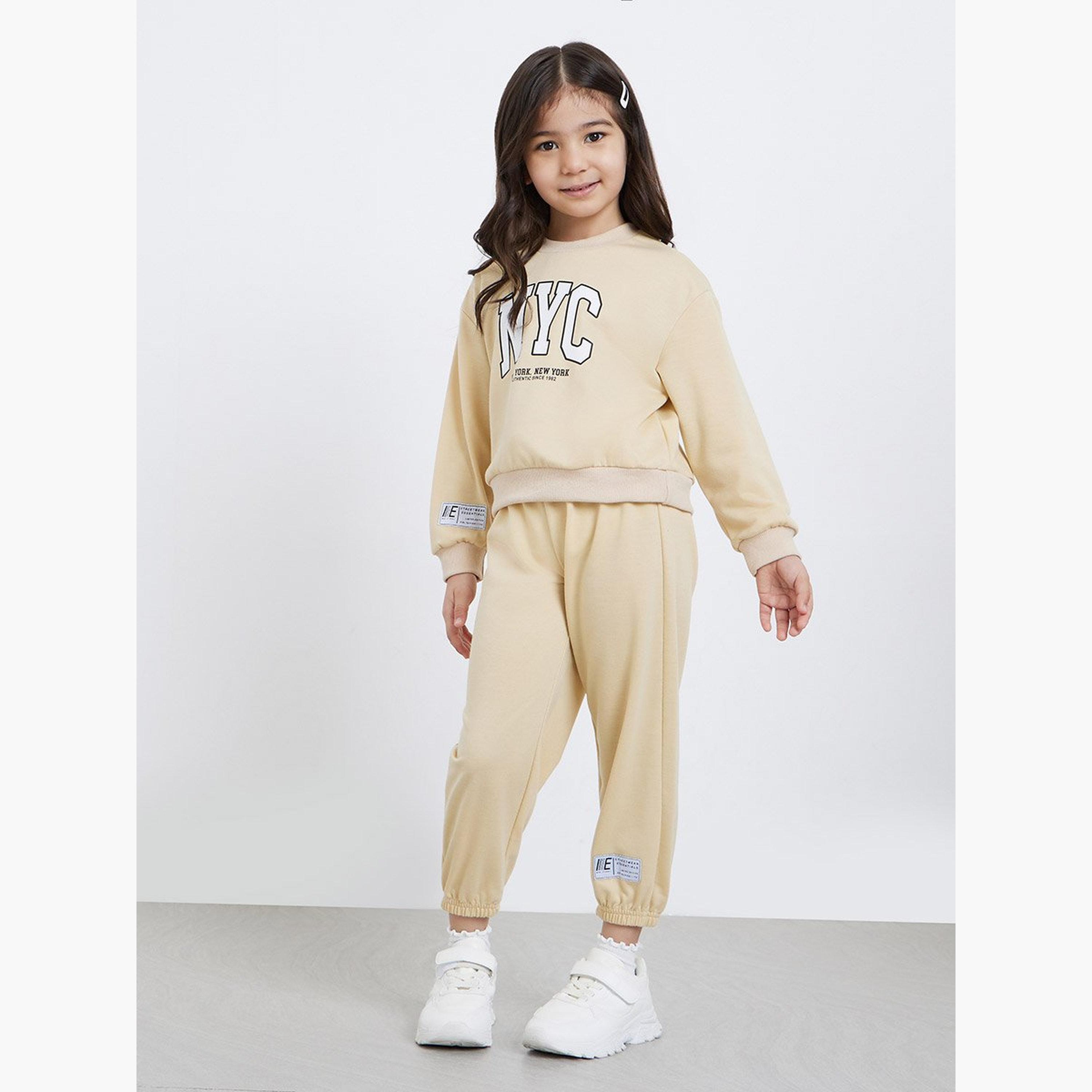 Styli Girls Beige NYC Print Sweatshirt and Joggers Set-girls-clothing-setsandcoords-image-1