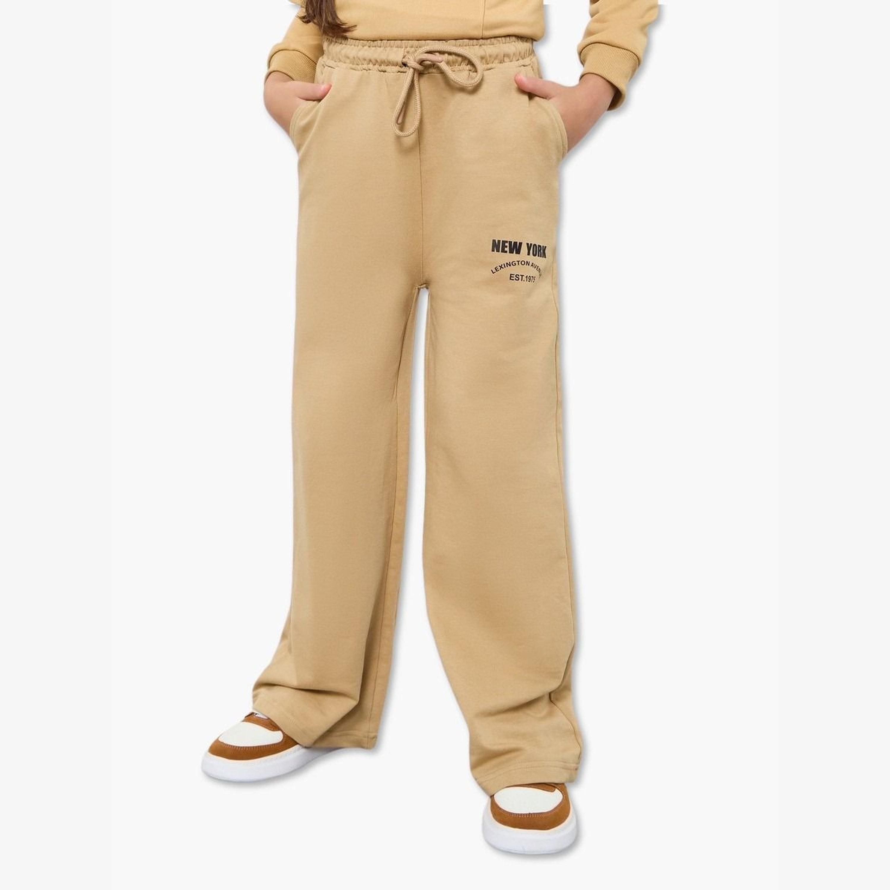 Styli Teens Beige New York Print Cotton Joggers-girls-clothing-bottoms-joggersandtrackpants-image-1