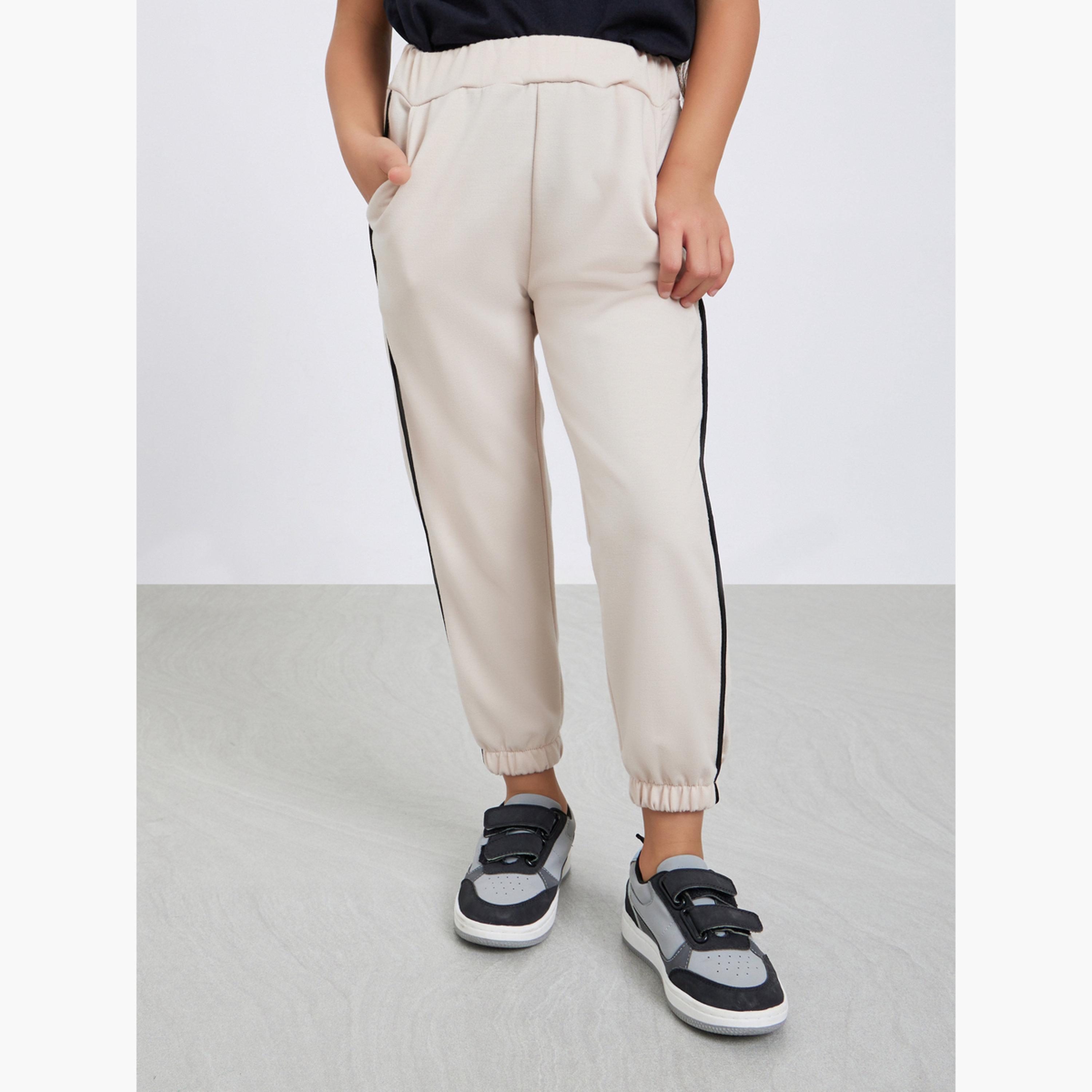 ستايلي - بنطال رياضي سادة باللون البيج مع رباط جانبي للبنات-girls-clothing-bottoms-joggersandtrackpants-image-1