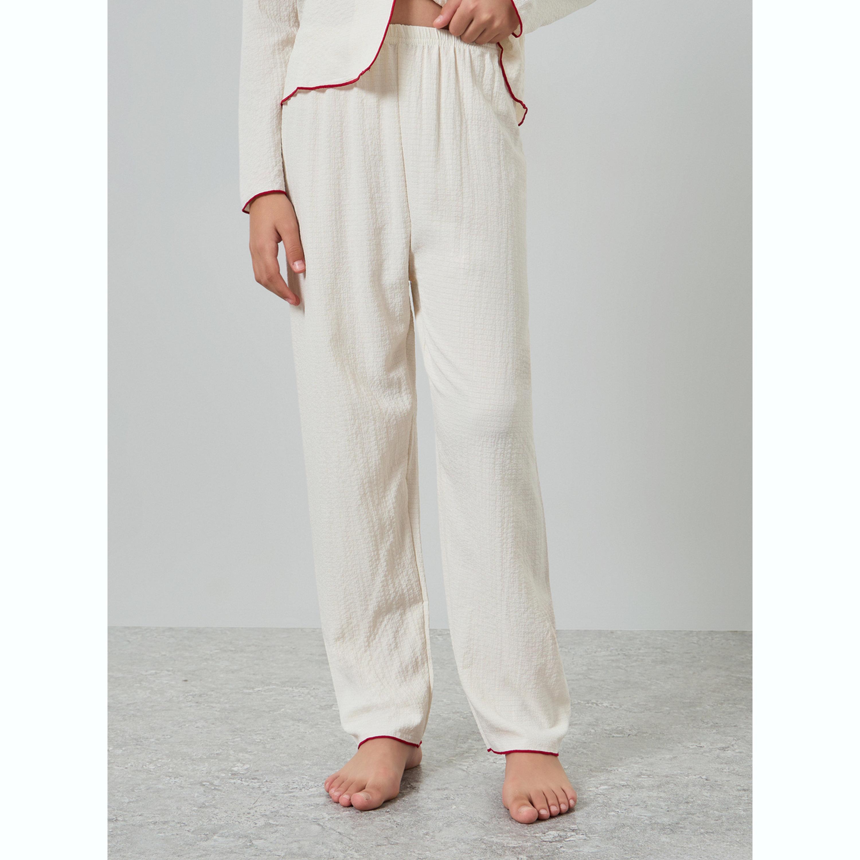 طقم بيجاما من بنطال وبلوزة بأكمام طويلة وتفاصيل بارزة الملمس-girls-clothing-nightwear-image-5