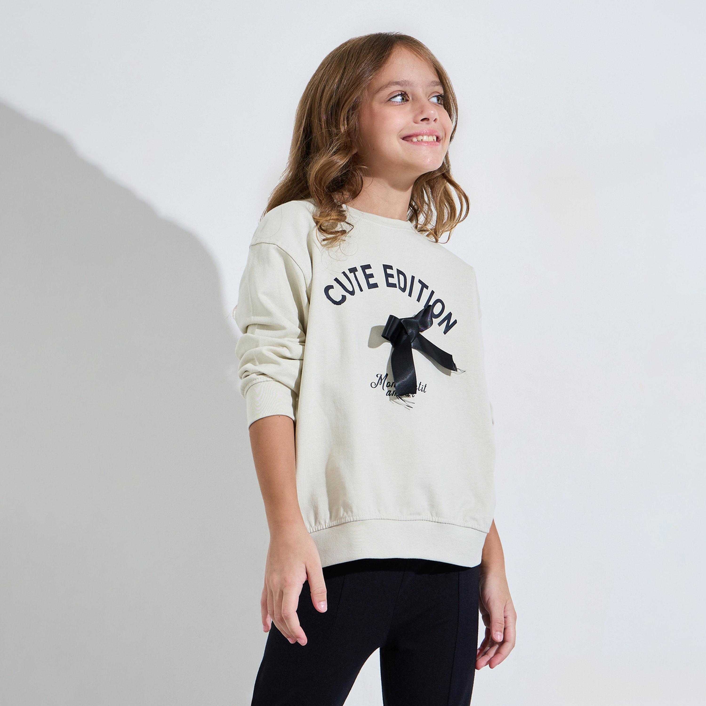 Styli Girls Beige Graphic Print Bow Detail Oversized Sweatshirt-girls-clothing-sweatshirts-image-1
