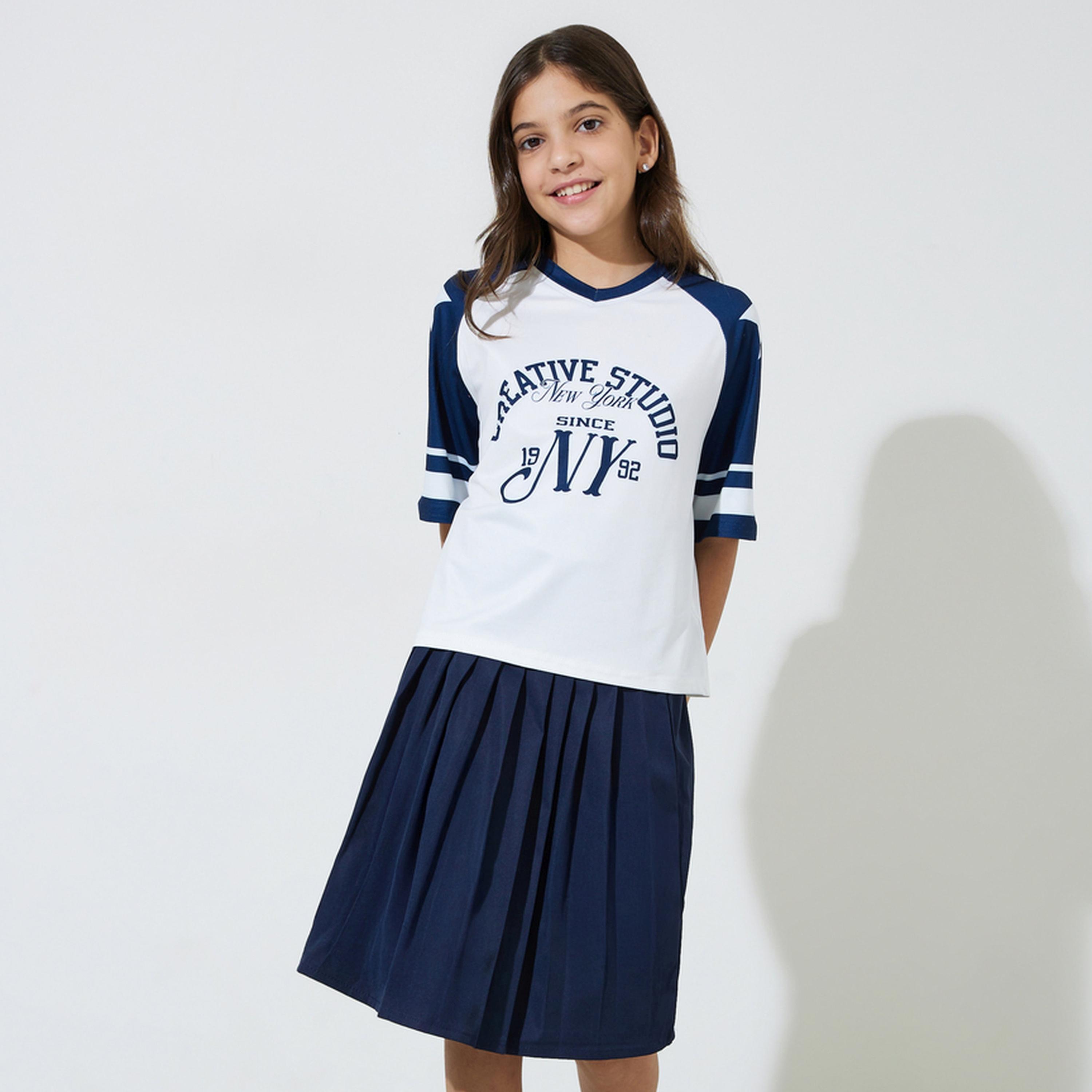Styli Teen Girls Graphic Print Oversized T-Shirt and Pleated knee Length Skirt Set-girls-clothing-setsandcoords-image-1