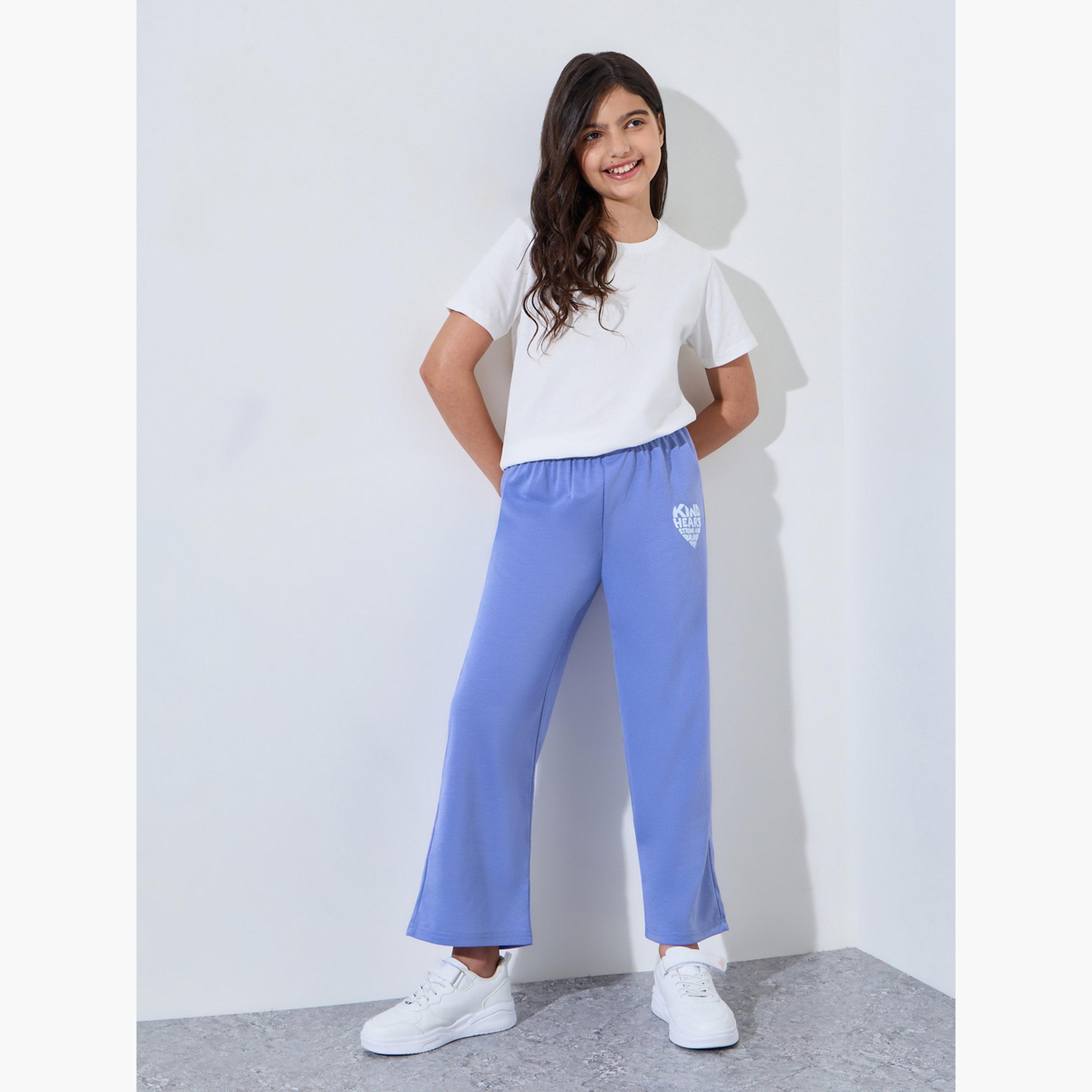 جوغر بأرجل واسعة وطبعة جرافيك للبنات لون أزرق-girls-clothing-bottoms-joggersandtrackpants-image-2