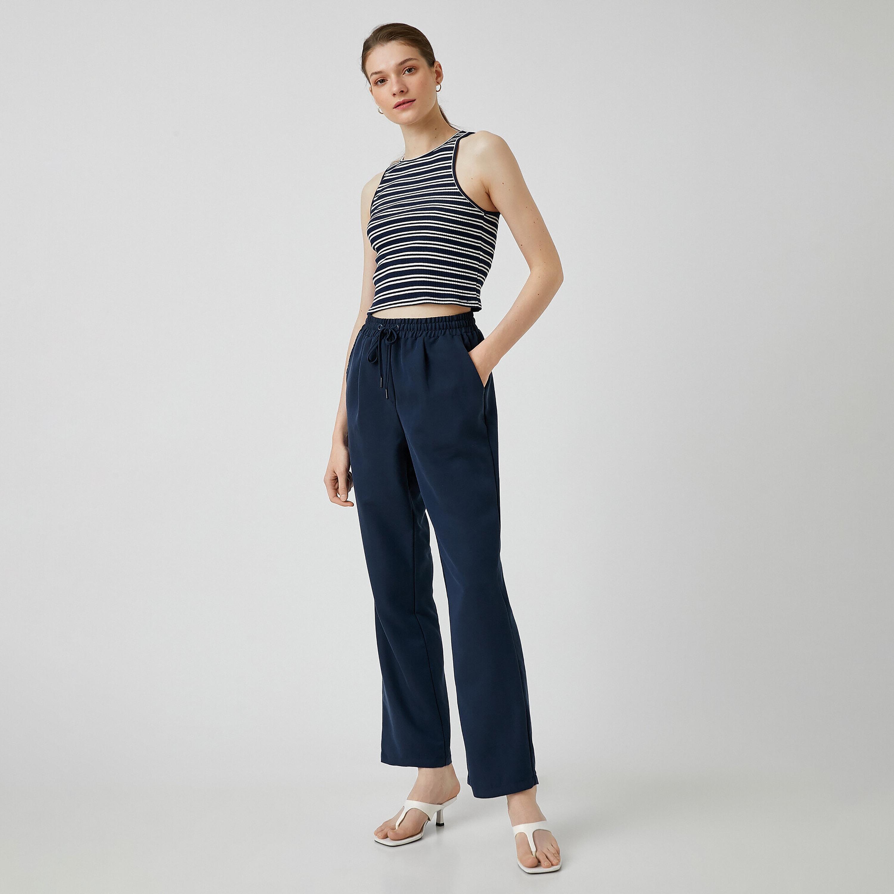 بنطال نسائي بقصة ضيقة تتسع أسفل الركبة (بوتكات) وخصر برباط بلون كحلي من كوتون-women-clothing-bottoms-trousers-image-3