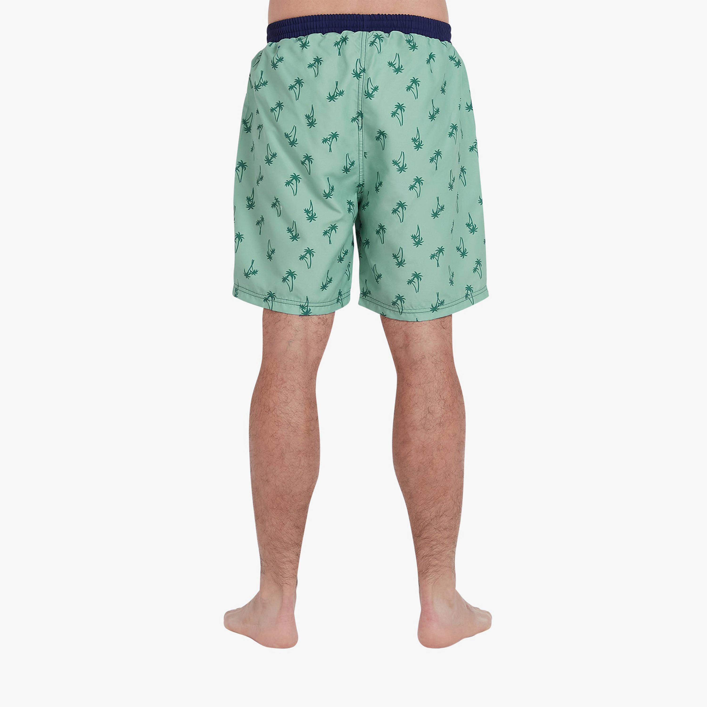 كويغا - شورت سباحة رجالي، أزرق داكن بنقشة نخيل الربيع-sports-men-clothing-swimwear-image-2