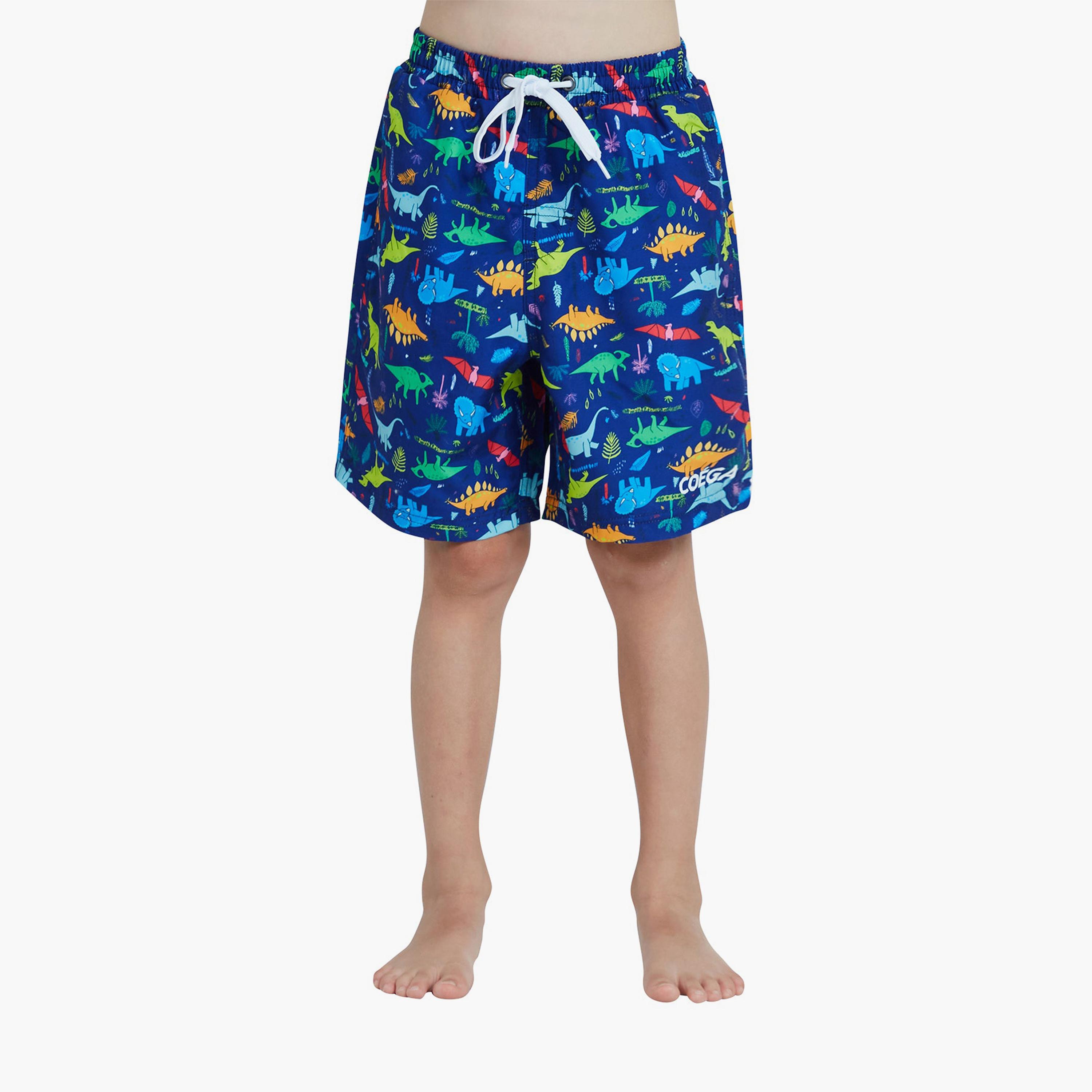 كويغا - شورت سباحة للأولاد، أزرق اللون-boys-clothing-sportswear-swimwear-image-1