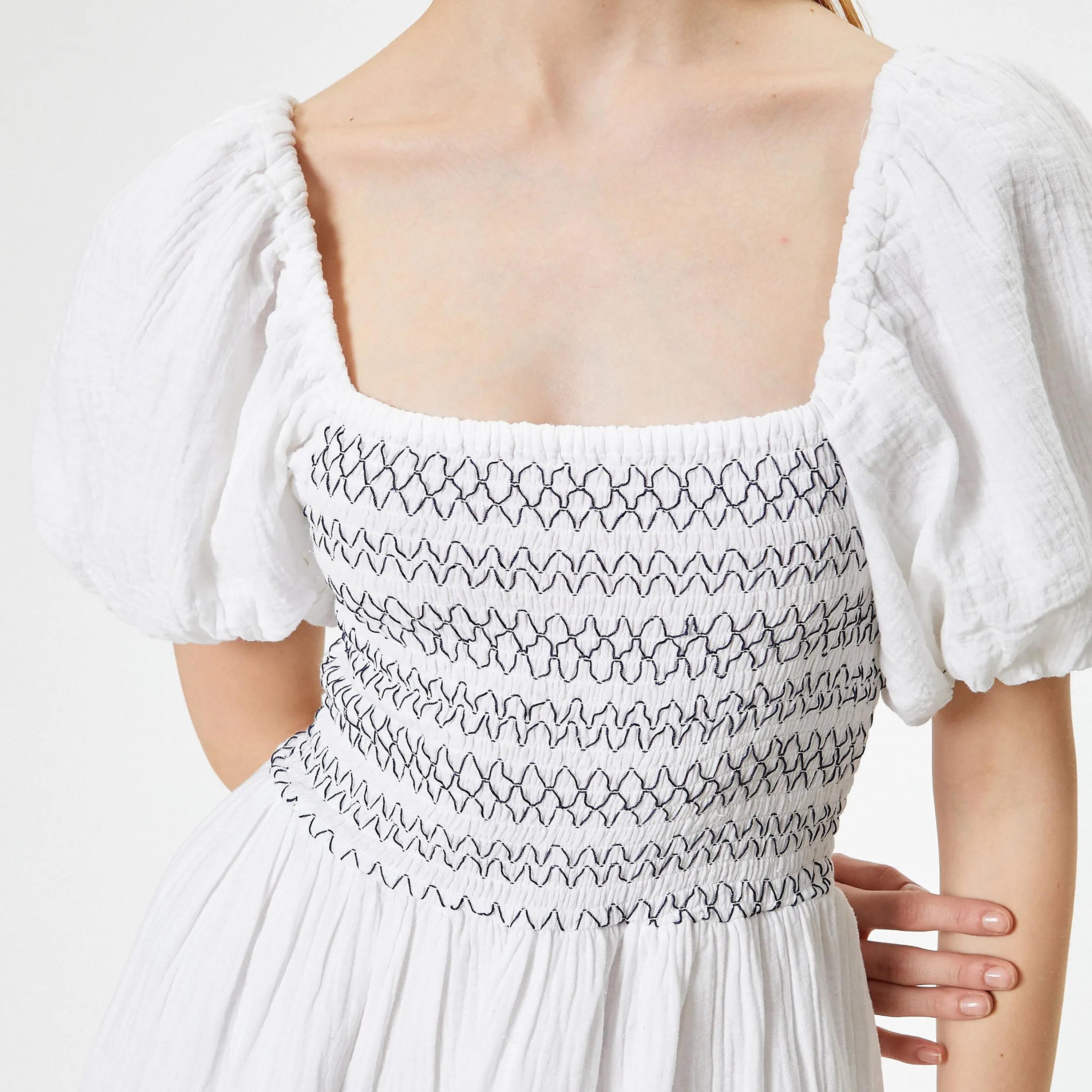 فستان نسائي متوسط الطول من القطن الأبيض المزركش بأكمام منتفخة ورقبة مربعة من كوتون-women-clothing-dresses-image-4
