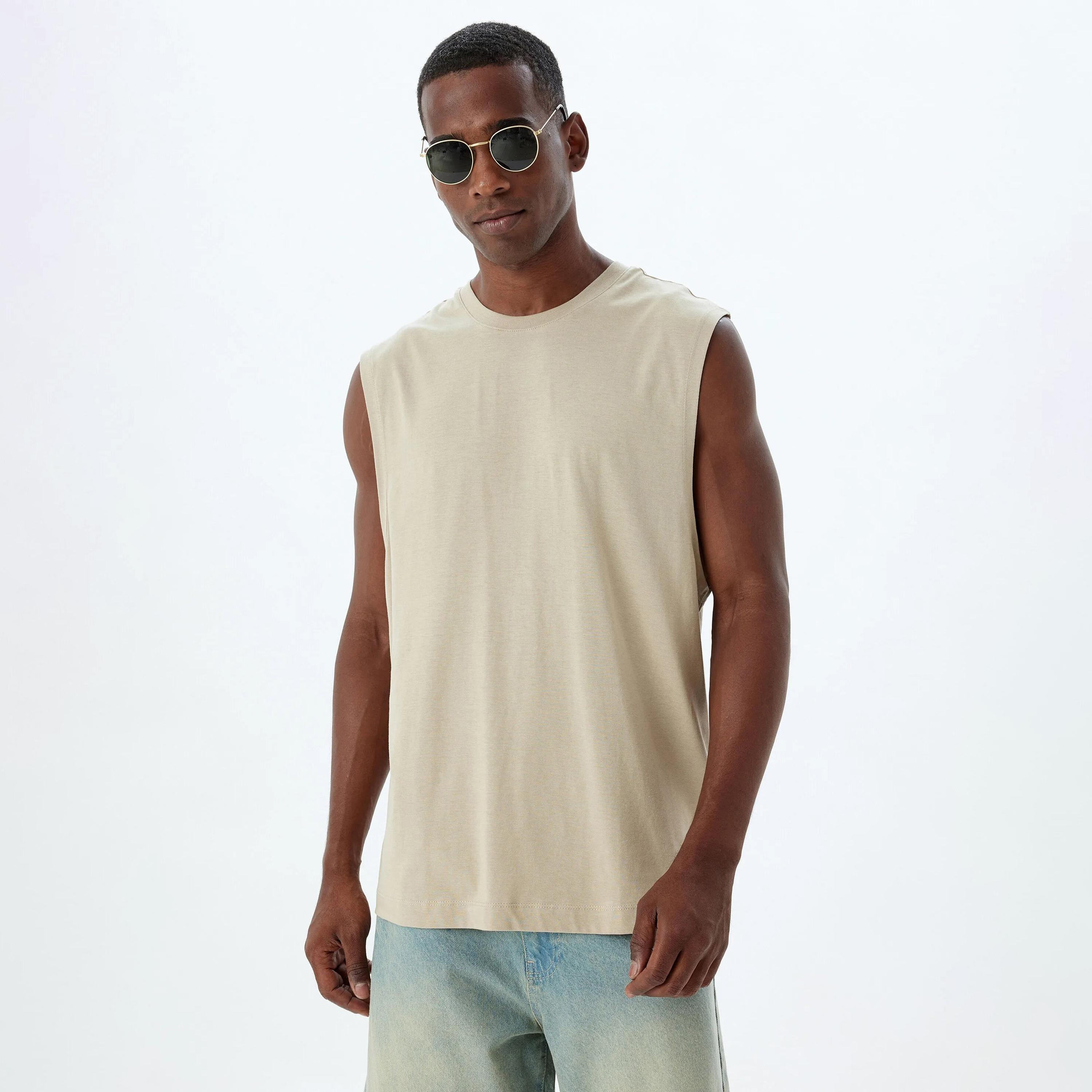 تي شيرت رجالي سادة بدون أكمام ورقبة دائرية من كوتون-men-clothing-tshirtsandpolos-tshirts-image-1