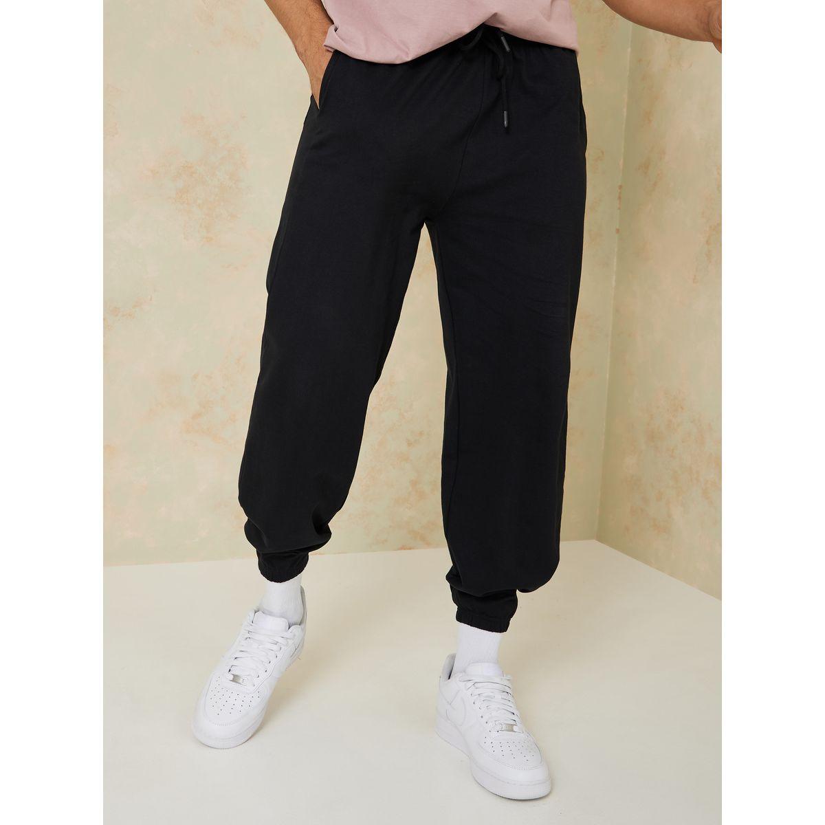 جوغر بقصة مريحة واساور مطاطية-men-clothing-bottoms-joggers-image-2