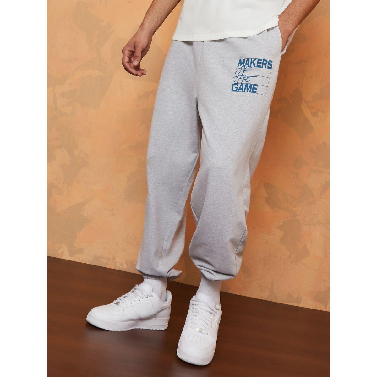 جوغر مطبع بكتابة وقصة واسعة-men-clothing-bottoms-joggers-image-1