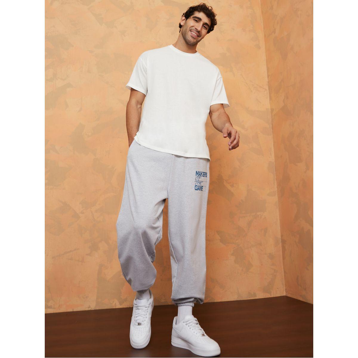 جوغر مطبع بكتابة وقصة واسعة-men-clothing-bottoms-joggers-image-2