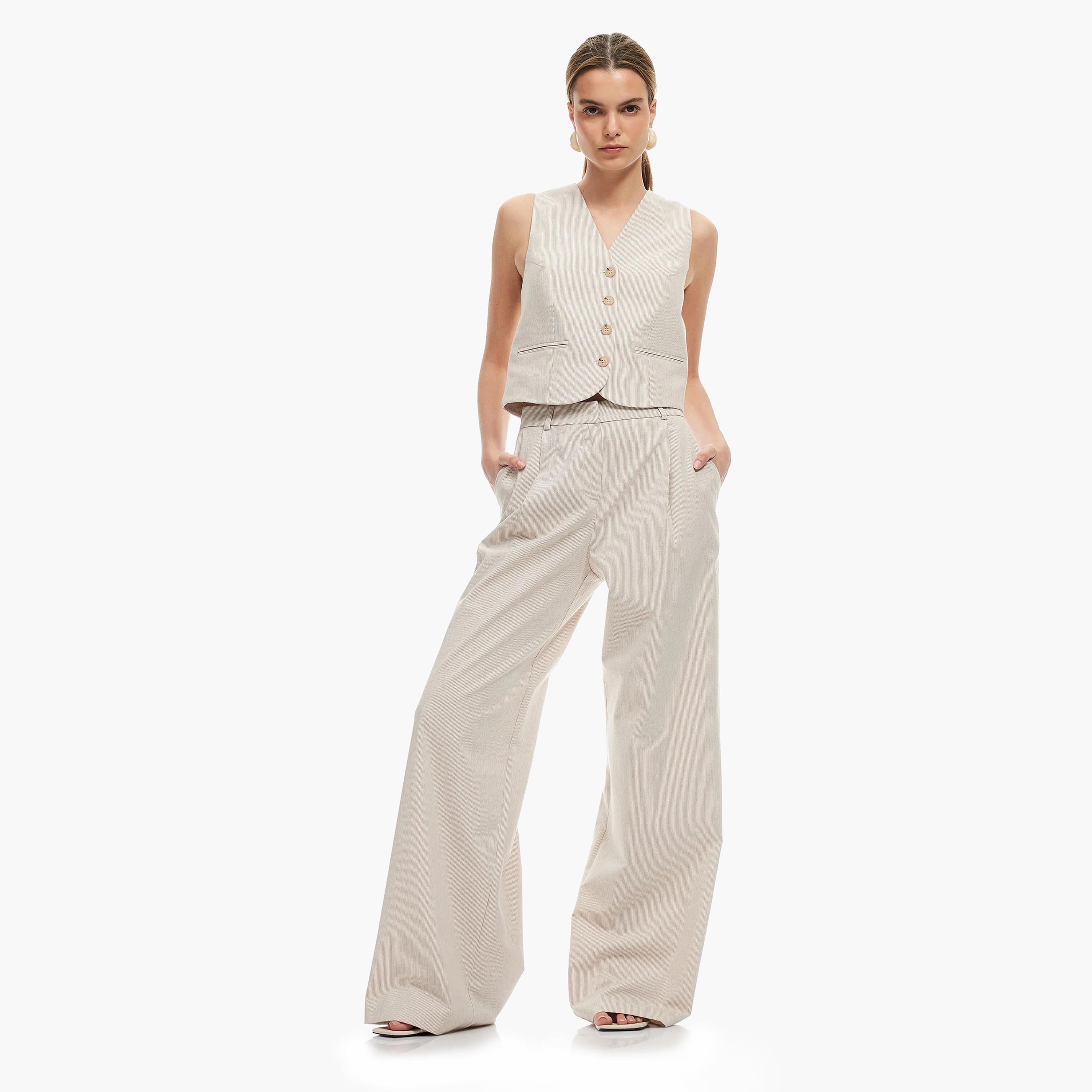 بنطلون نسائي واسع بخصر عالٍ مع زر وسحاب للإغلاق باللون البيج من كوتون.-women-clothing-bottoms-trousers-image-2