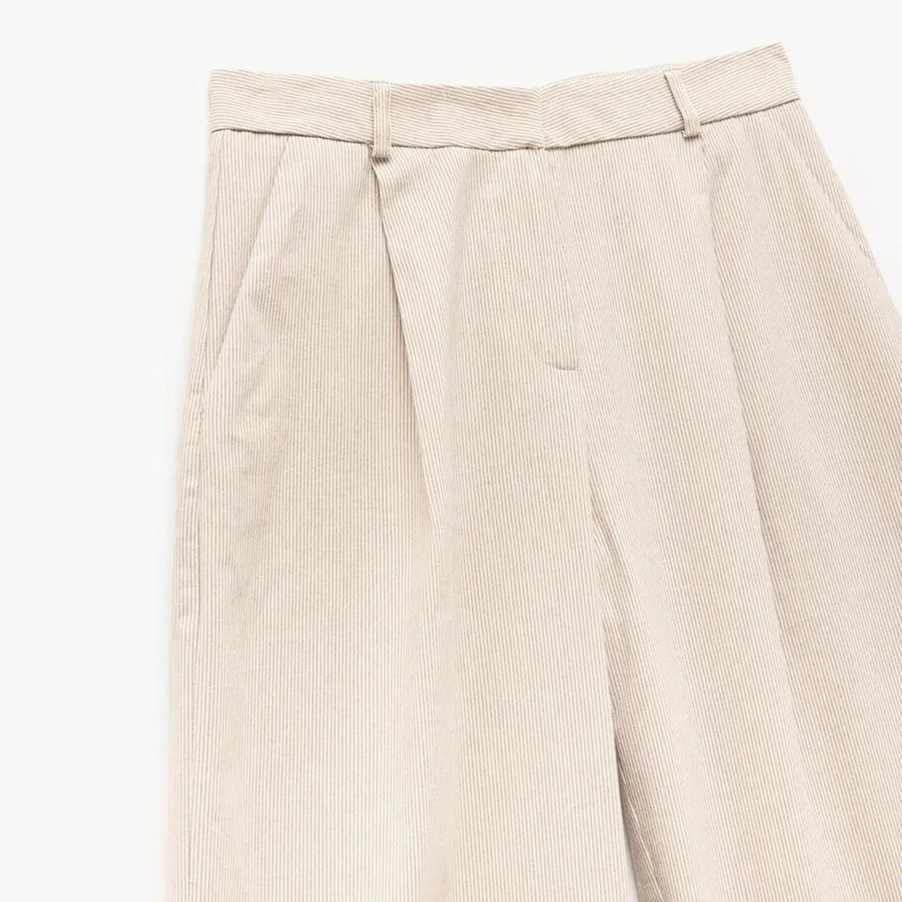 بنطلون نسائي واسع بخصر عالٍ مع زر وسحاب للإغلاق باللون البيج من كوتون.-women-clothing-bottoms-trousers-image-4