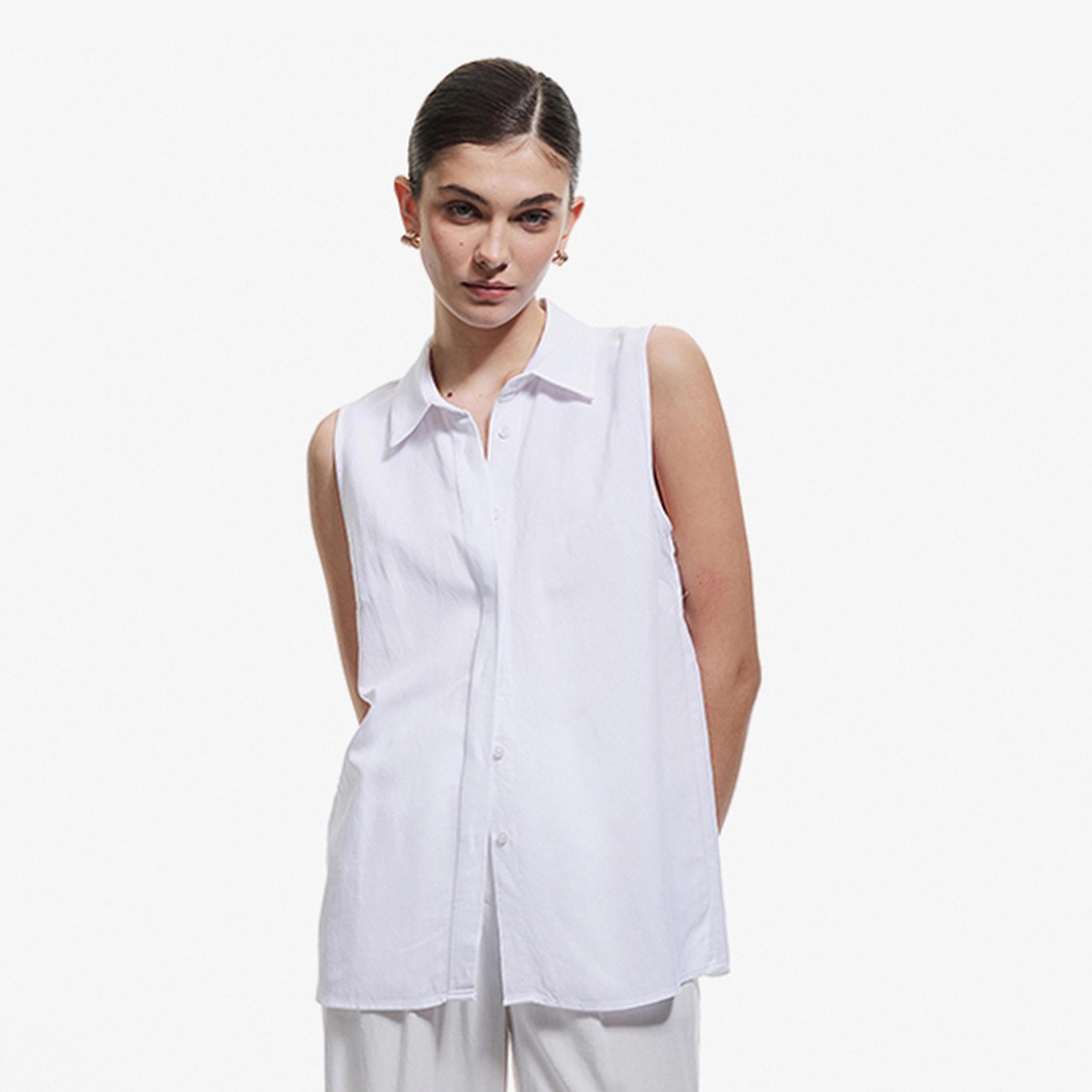 قميص نسائي بدون أكمام وياقة باللون الأبيض من كوتون.-women-clothing-shirtsandblouses-shirts-image-1