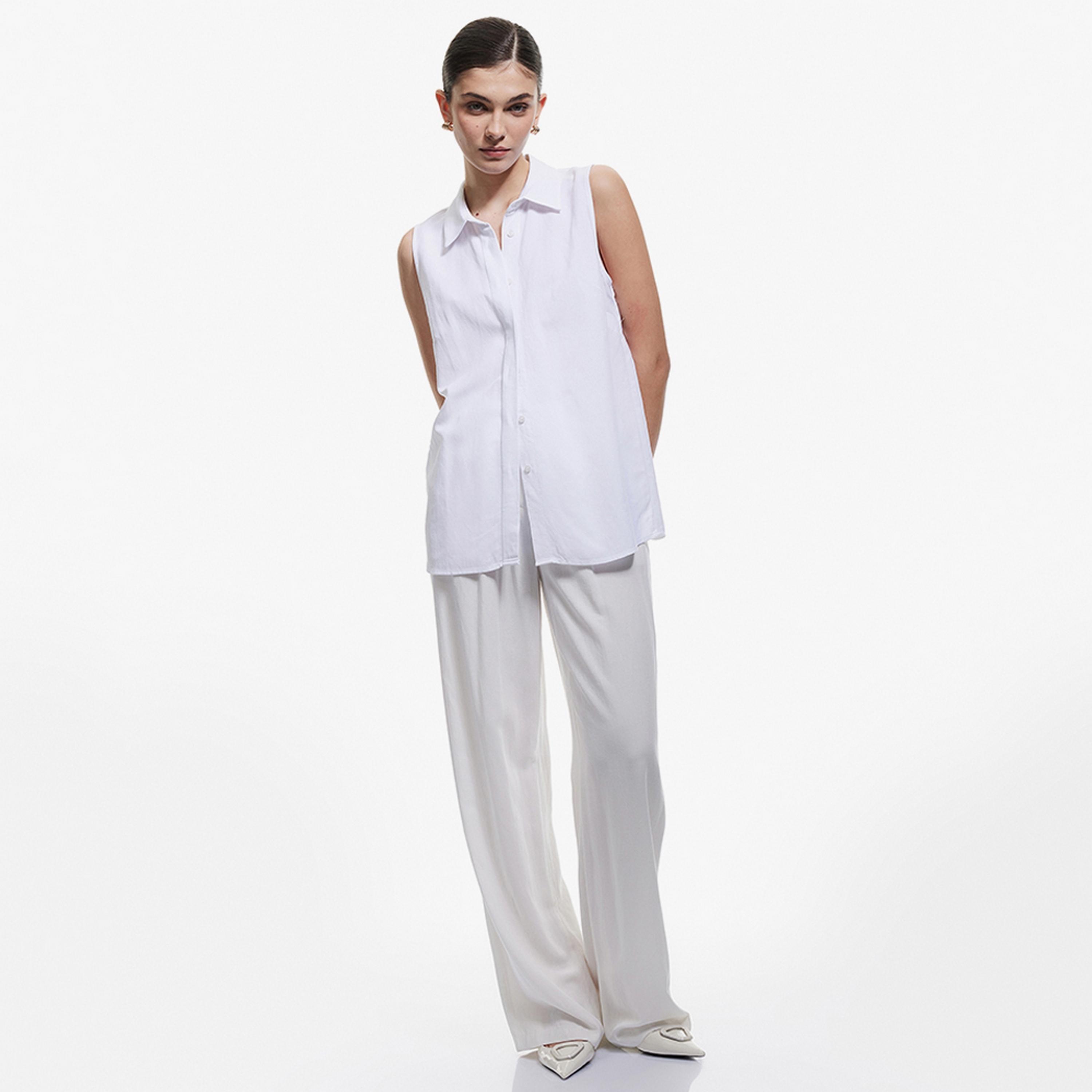 قميص نسائي بدون أكمام وياقة باللون الأبيض من كوتون.-women-clothing-shirtsandblouses-shirts-image-2