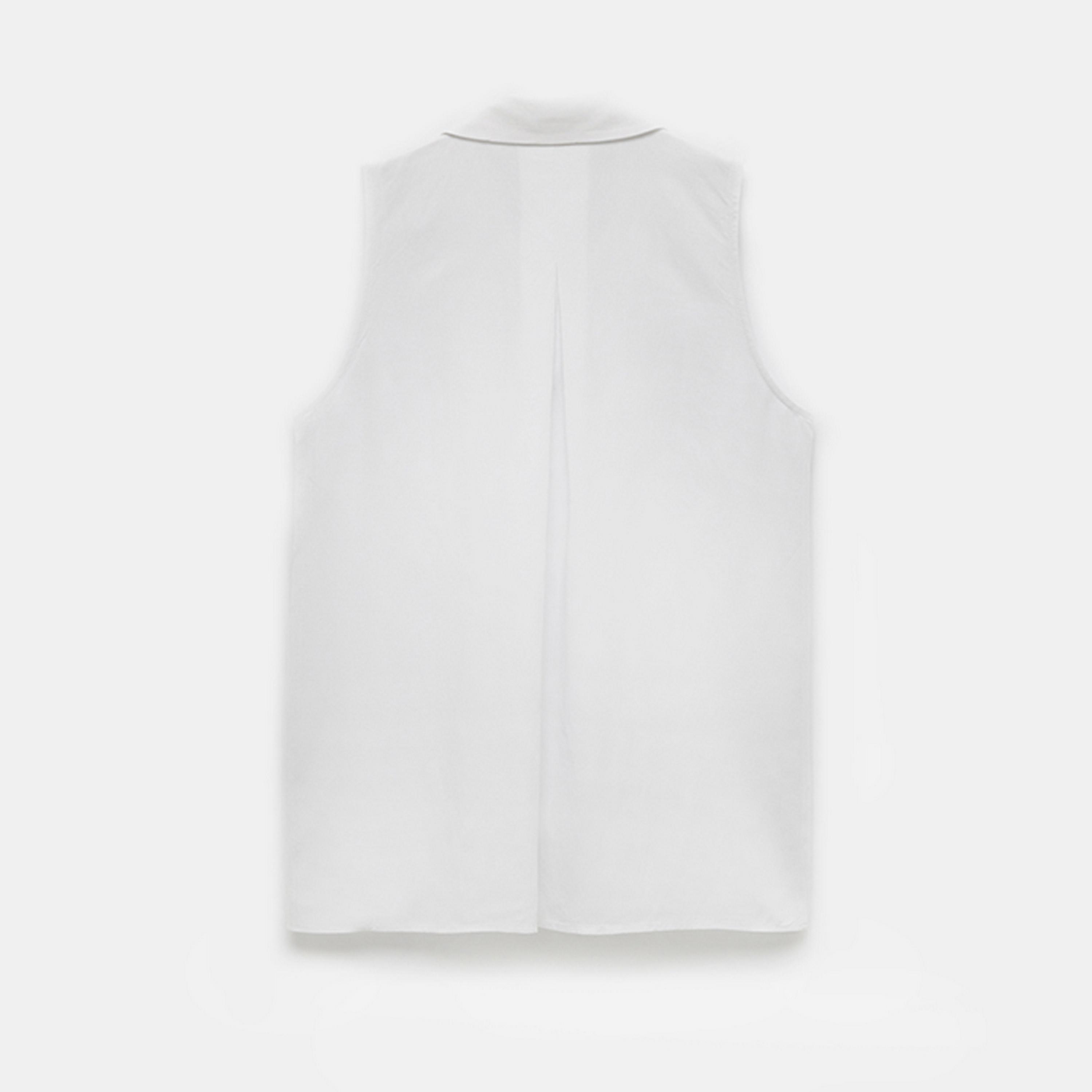 قميص نسائي بدون أكمام وياقة باللون الأبيض من كوتون.-women-clothing-shirtsandblouses-shirts-image-6