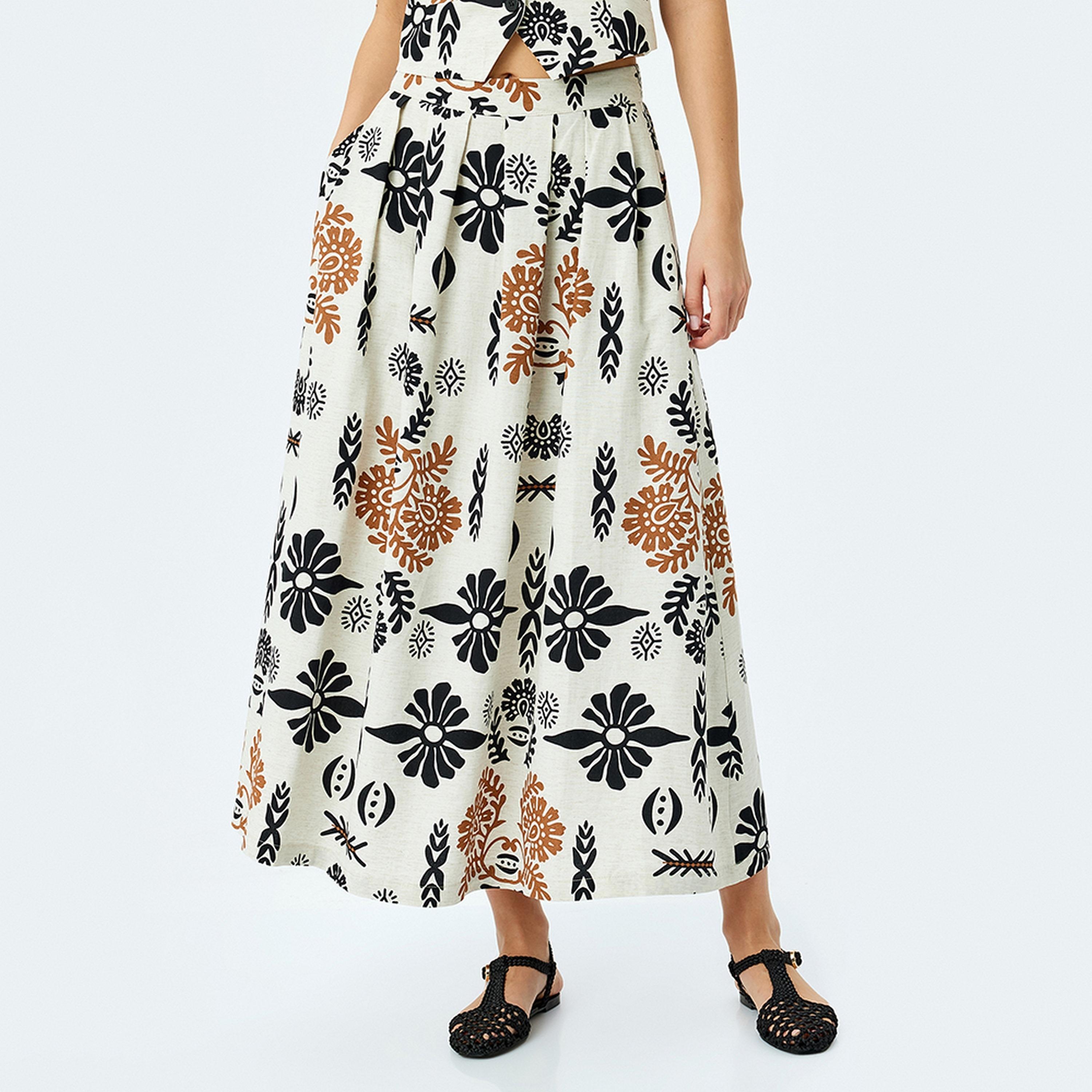 تنورة ميدي نسائية غير متماثلة ومطوية ومطبوعة من كوتون.-women-clothing-bottoms-skirts-image-1