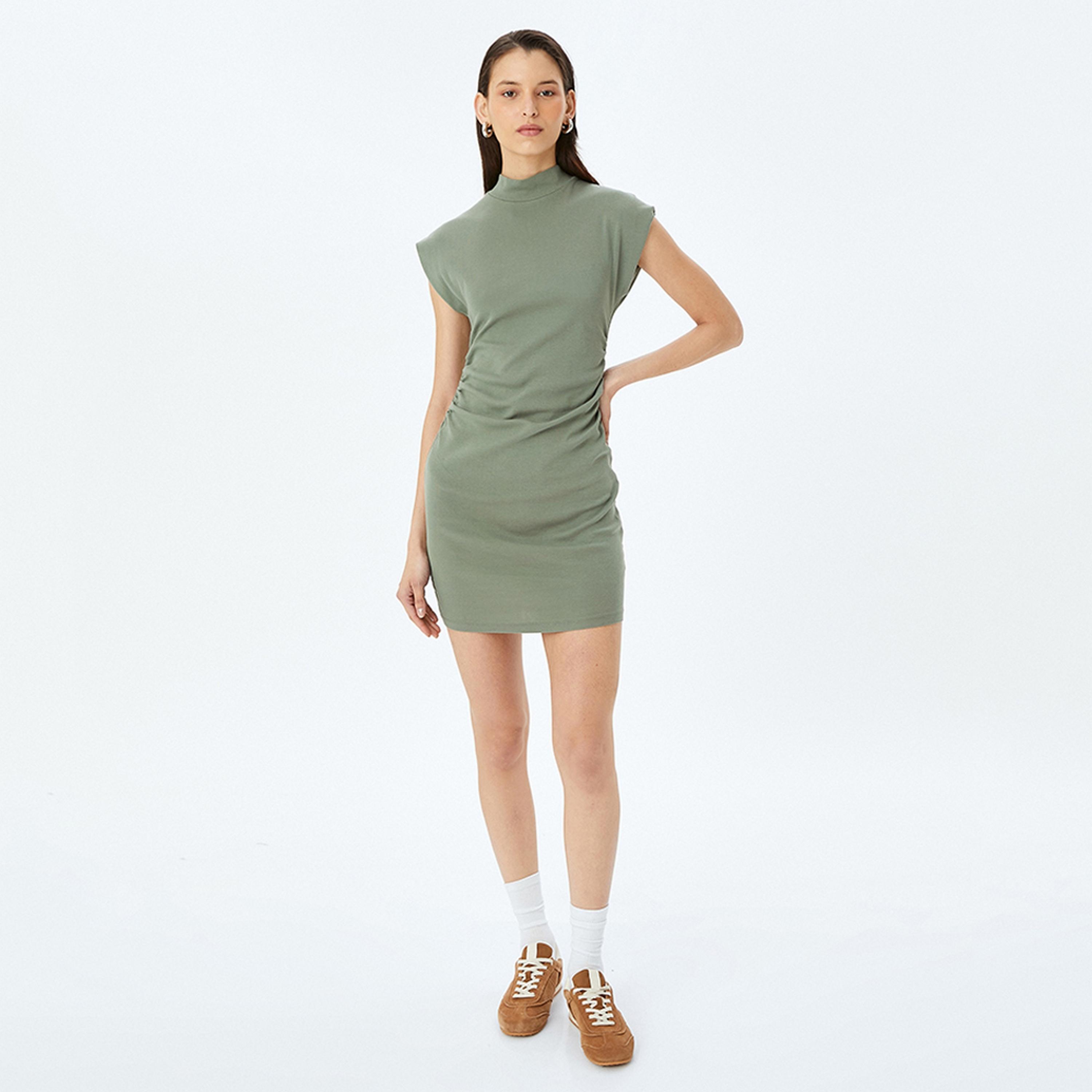 فستان ميني نسائي بقصة بوديكون بياقة عالية وأكمام كاب من القطن باللون الأخضر من كوتون.-women-clothing-dresses-image-1