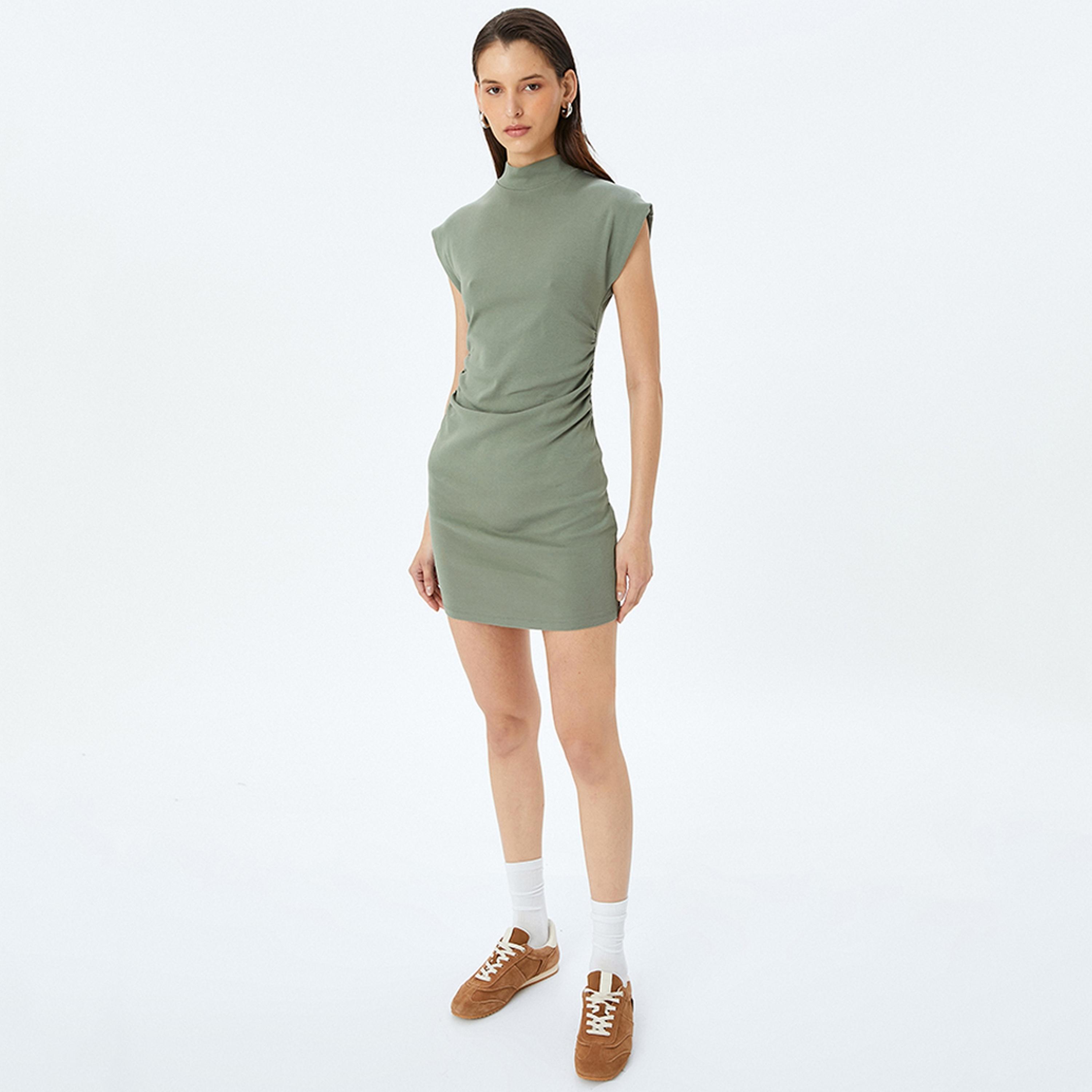فستان ميني نسائي بقصة بوديكون بياقة عالية وأكمام كاب من القطن باللون الأخضر من كوتون.-women-clothing-dresses-image-2