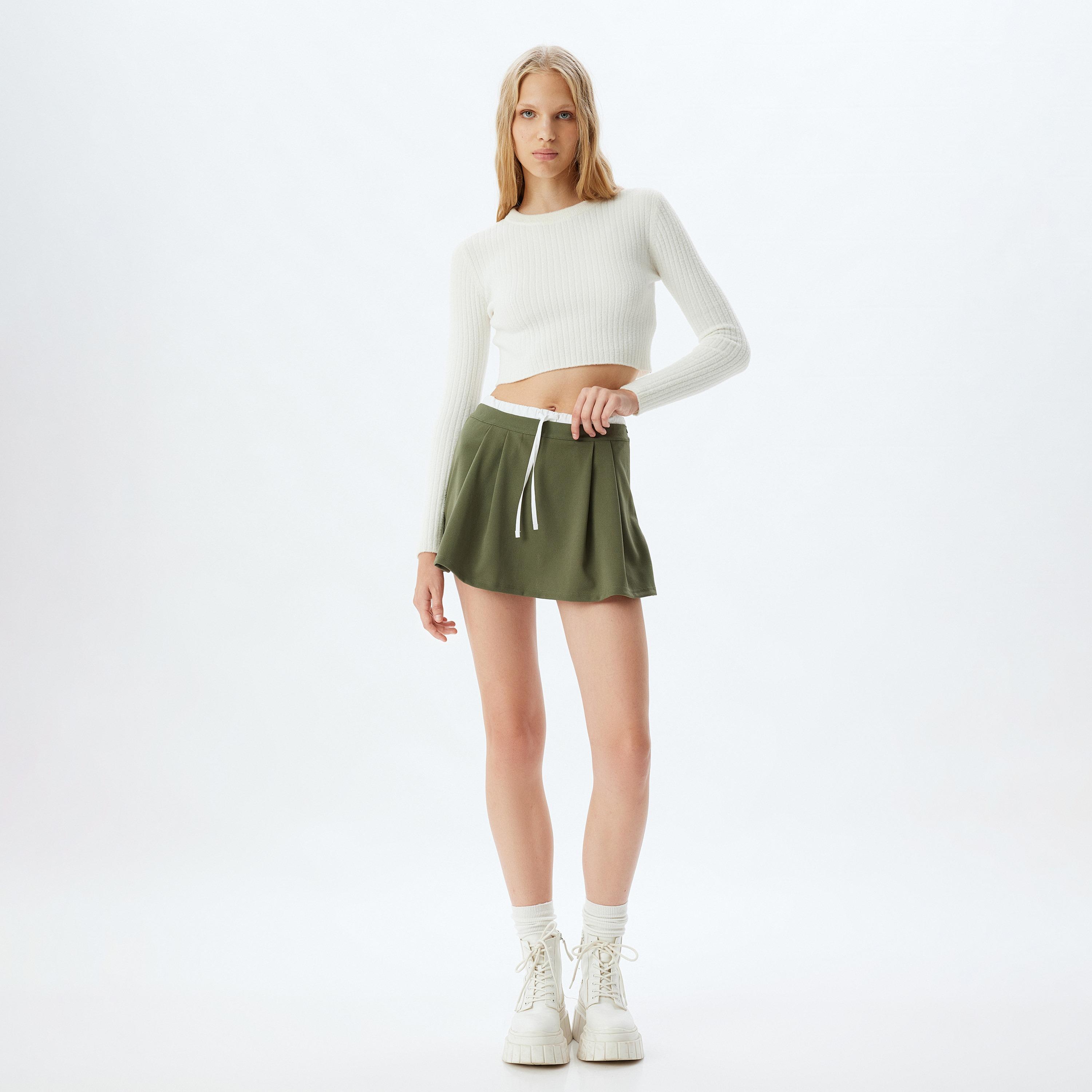 شورت تنورة نسائي بقصة ايه-لاين بلون أخضر من كوتون-women-clothing-skirts-image-2