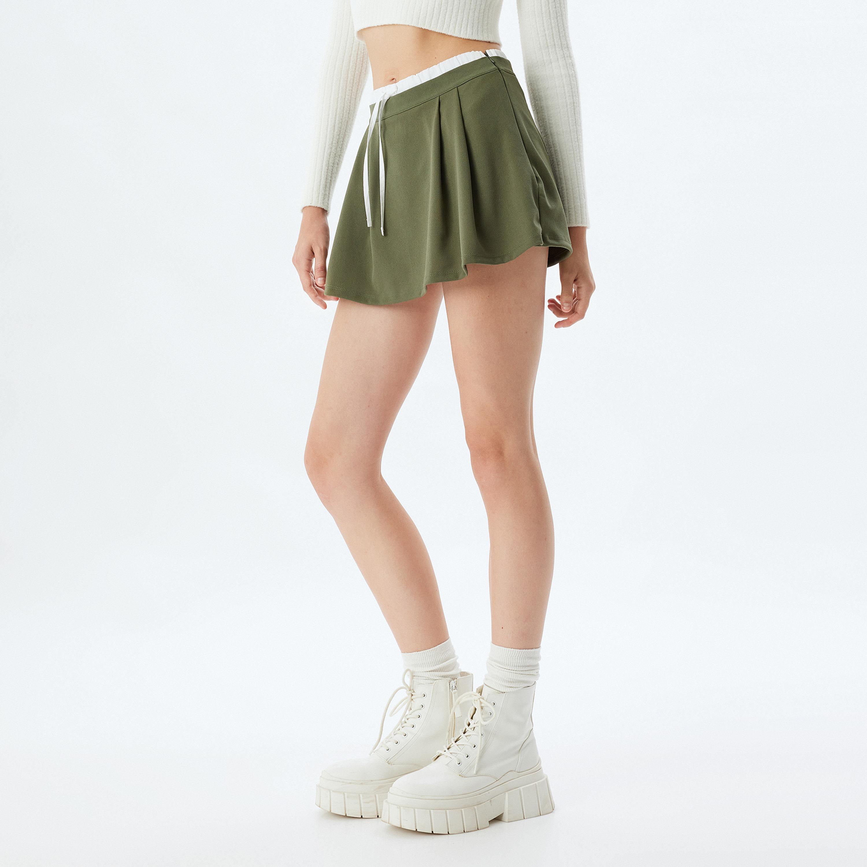 شورت تنورة نسائي بقصة ايه-لاين بلون أخضر من كوتون-women-clothing-skirts-image-3