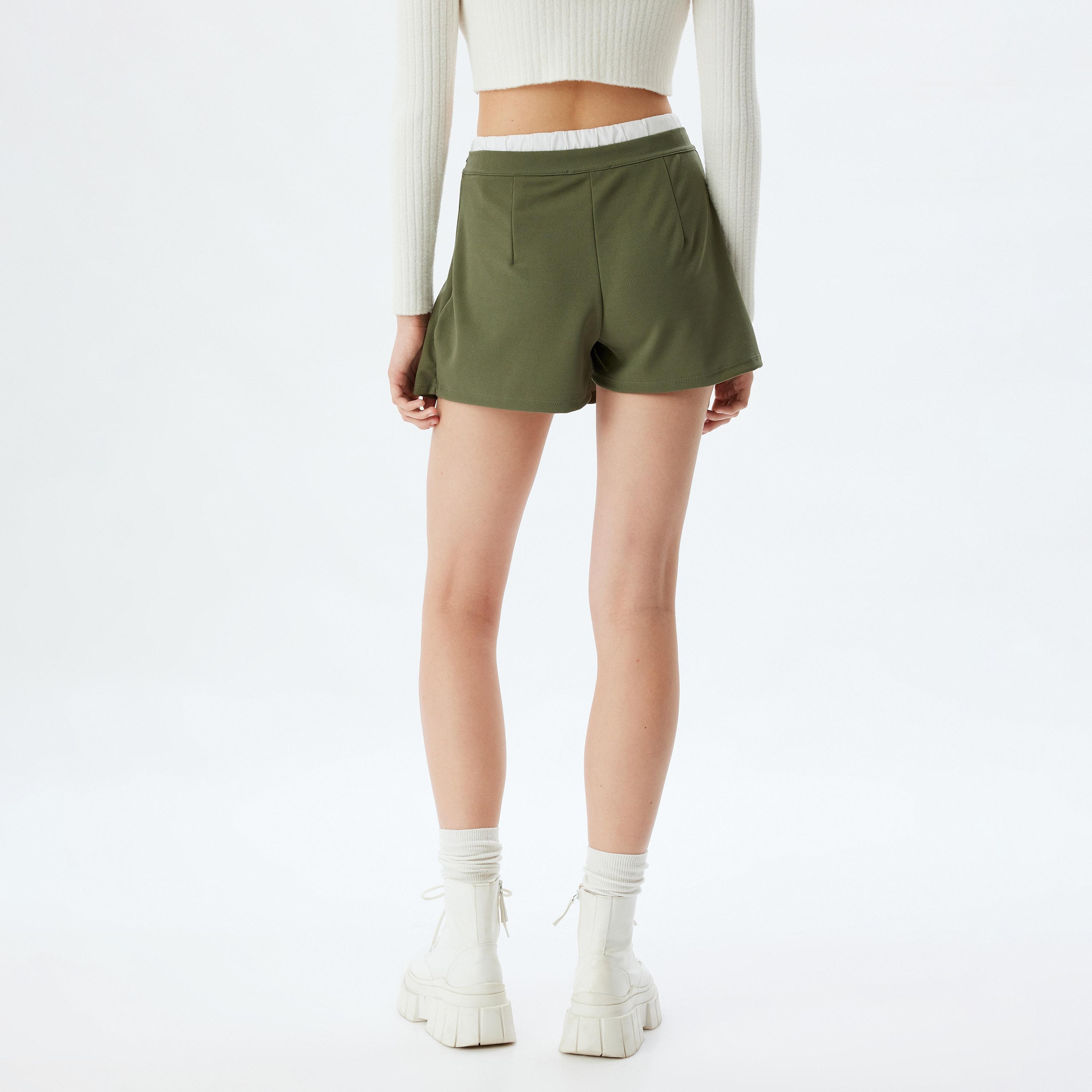 شورت تنورة نسائي بقصة ايه-لاين بلون أخضر من كوتون-women-clothing-skirts-image-4