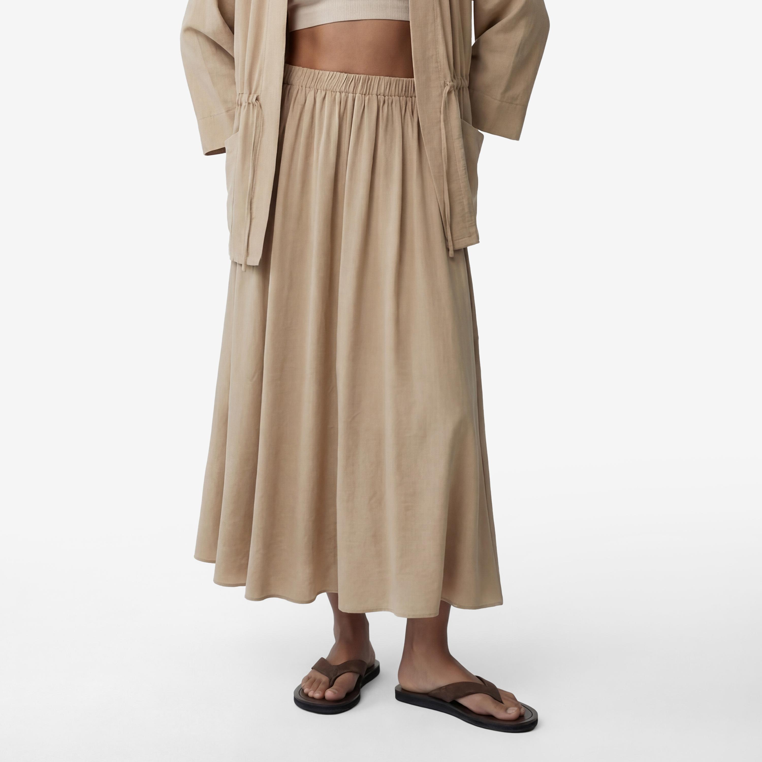 تنورة ميدي نسائية بقصة كلوش (فلير) بلون بيج من كوتون-women-clothing-bottoms-skirts-image-1