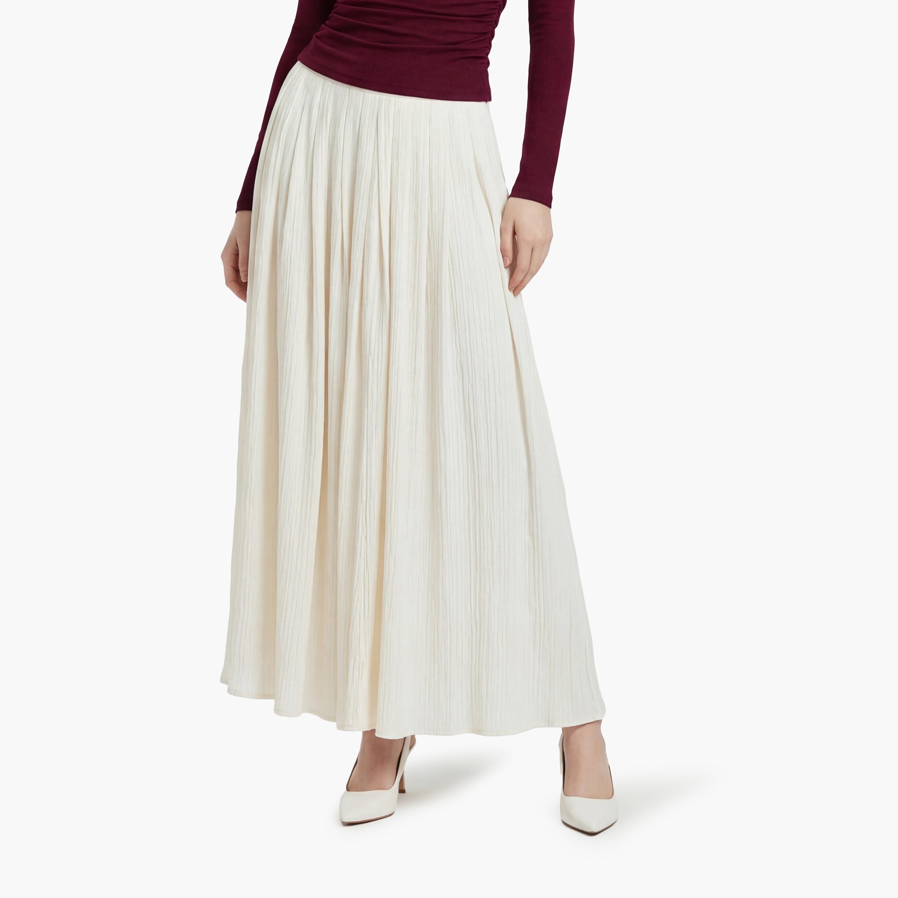 تنورة ماكسي نسائية بقصة كلوش من قماش بارز بلون كريمي من كوتون-women-clothing-bottoms-skirts-image-1