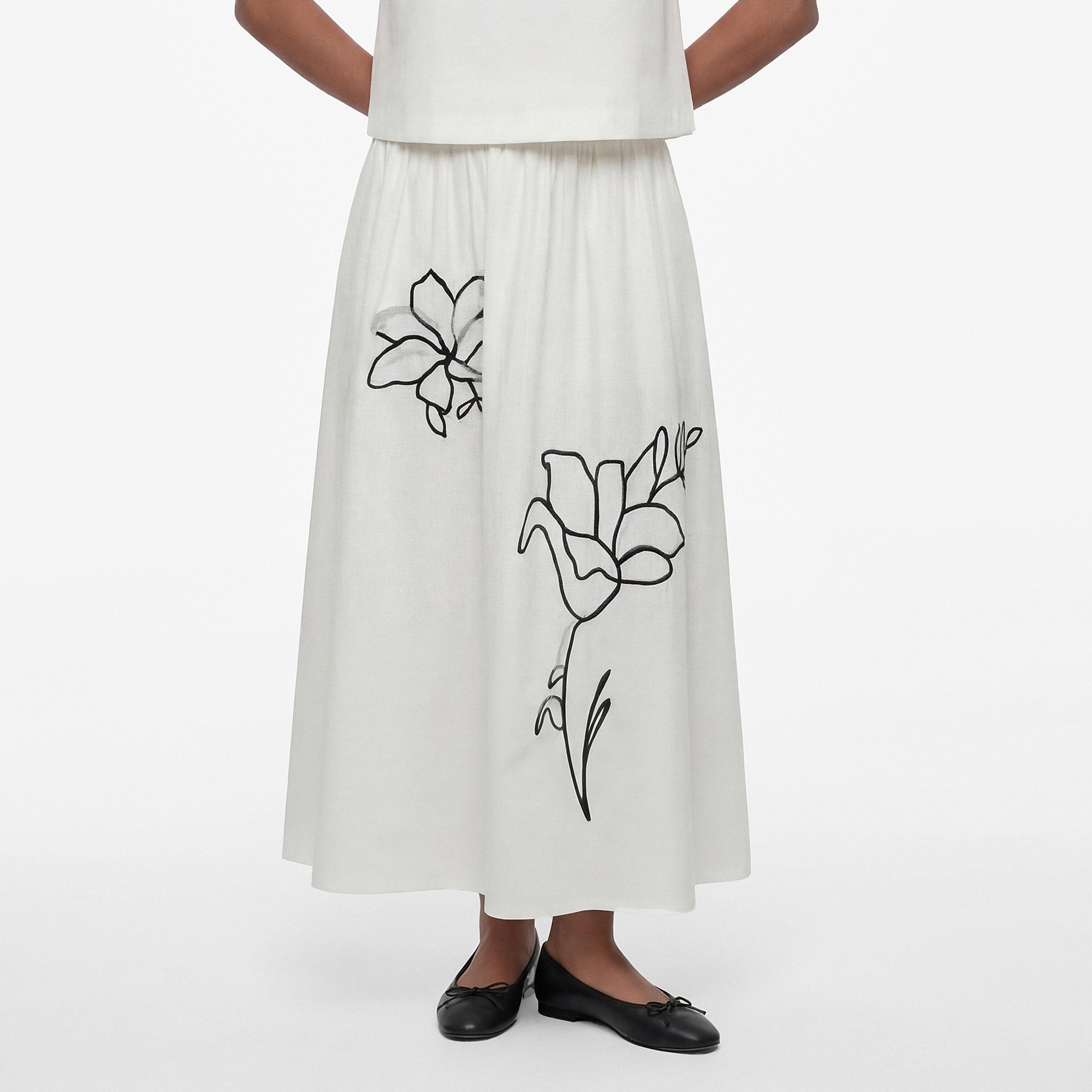 تنورة ماكسي نسائية قصة "ايه-لاين" بتطريز زهور بيضاء من كوتون-women-clothing-bottoms-skirts-image-1