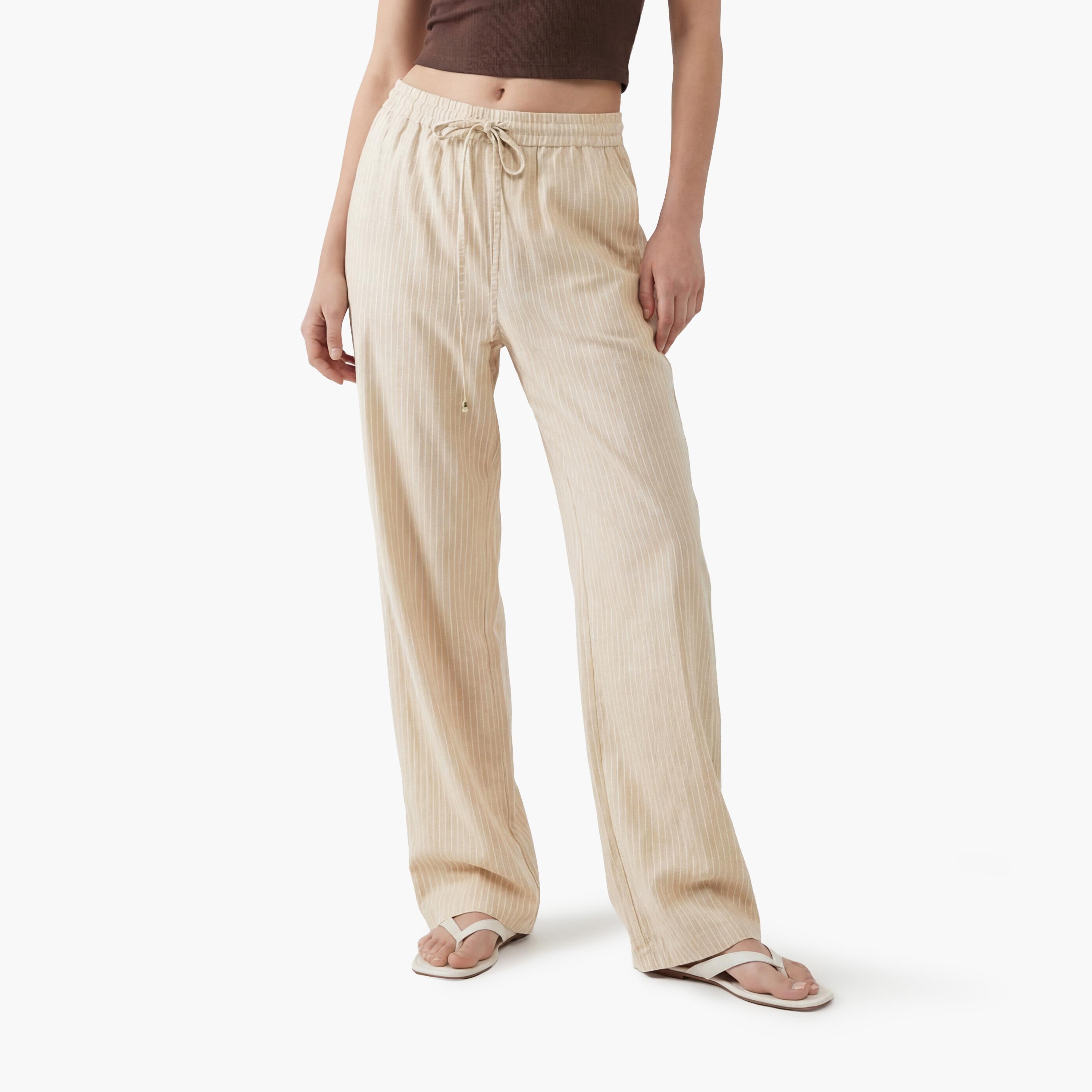 بنطلون نسائي واسع الساق بخصر برباط وتصميم مخطط بلون بيج من كوتون-women-clothing-bottoms-trousers-image-1